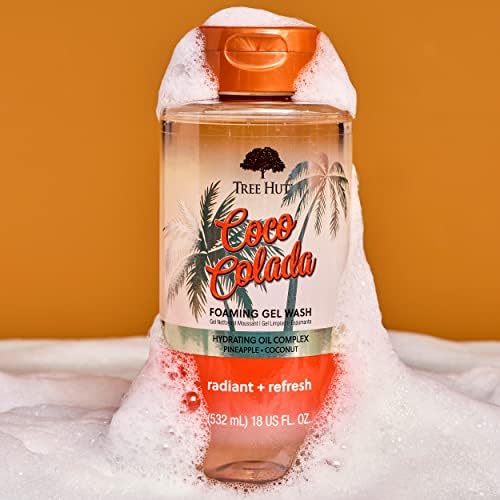 Tree Hut Coco Colada foaming body wash in an 18 fl oz bottle, featuring a tropical coconut scent and skin cleansing formula.