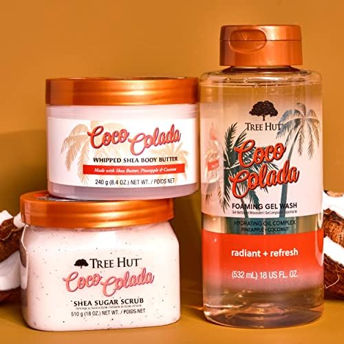 Tree Hut Coco Colada foaming body wash in 18 oz bottle, coconut and pineapple scent, skin cleaning agent with rich foam.