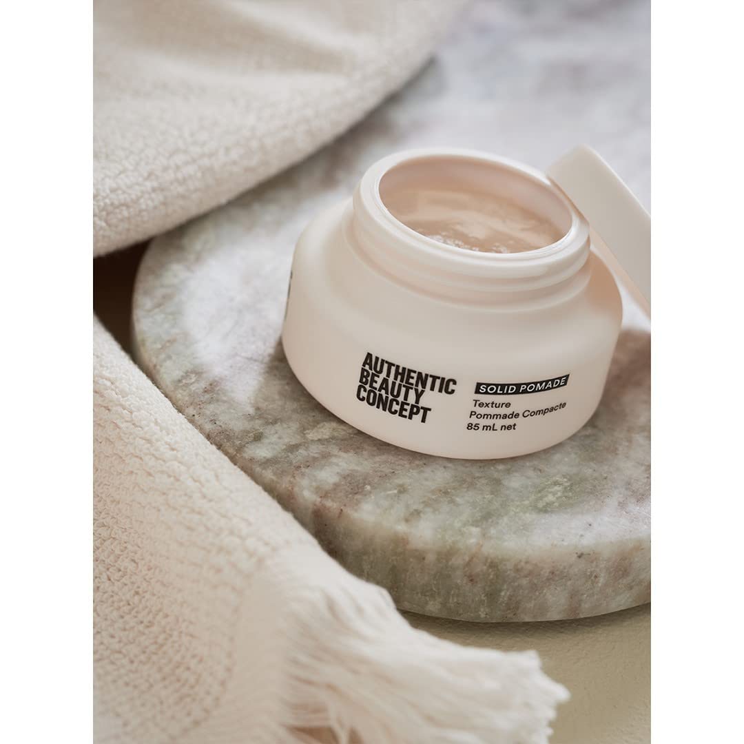Authentic Beauty Concept Solid Pomade for textured hair, medium hold, shiny finish, suitable for all hair types, vegan and silicone-free.