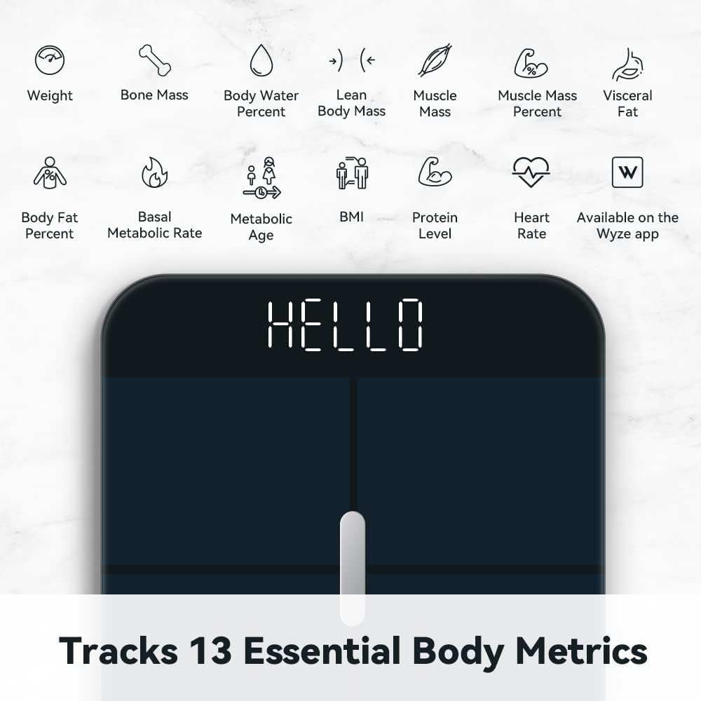 Wyze Smart Scale X digital bathroom scale in black showing body weight and fat measurement on a flat surface.