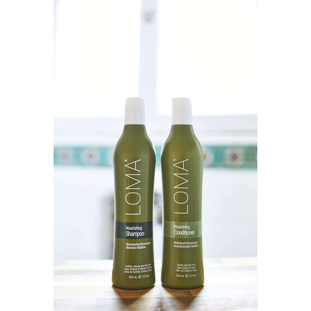 Loma Nourishing Conditioner 12 oz bottle, sulfate-free conditioner with smooth, shiny hair, and natural ingredients.