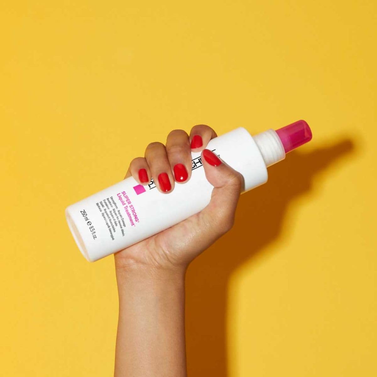 Paul Mitchell Super Strong Liquid Treatment conditioner for damaged hair, 8.5 fl oz, strengthens and repairs hair damage.