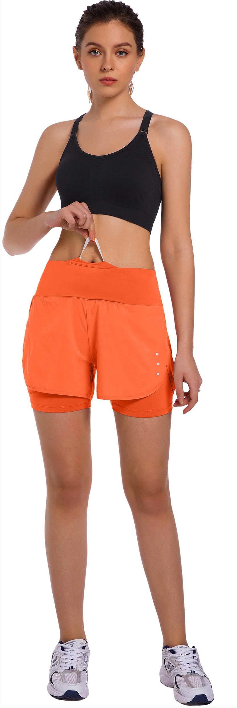 Ksmien Women's 2 in 1 Running Shorts with Liner Phone Pockets – close-up detail in Orange