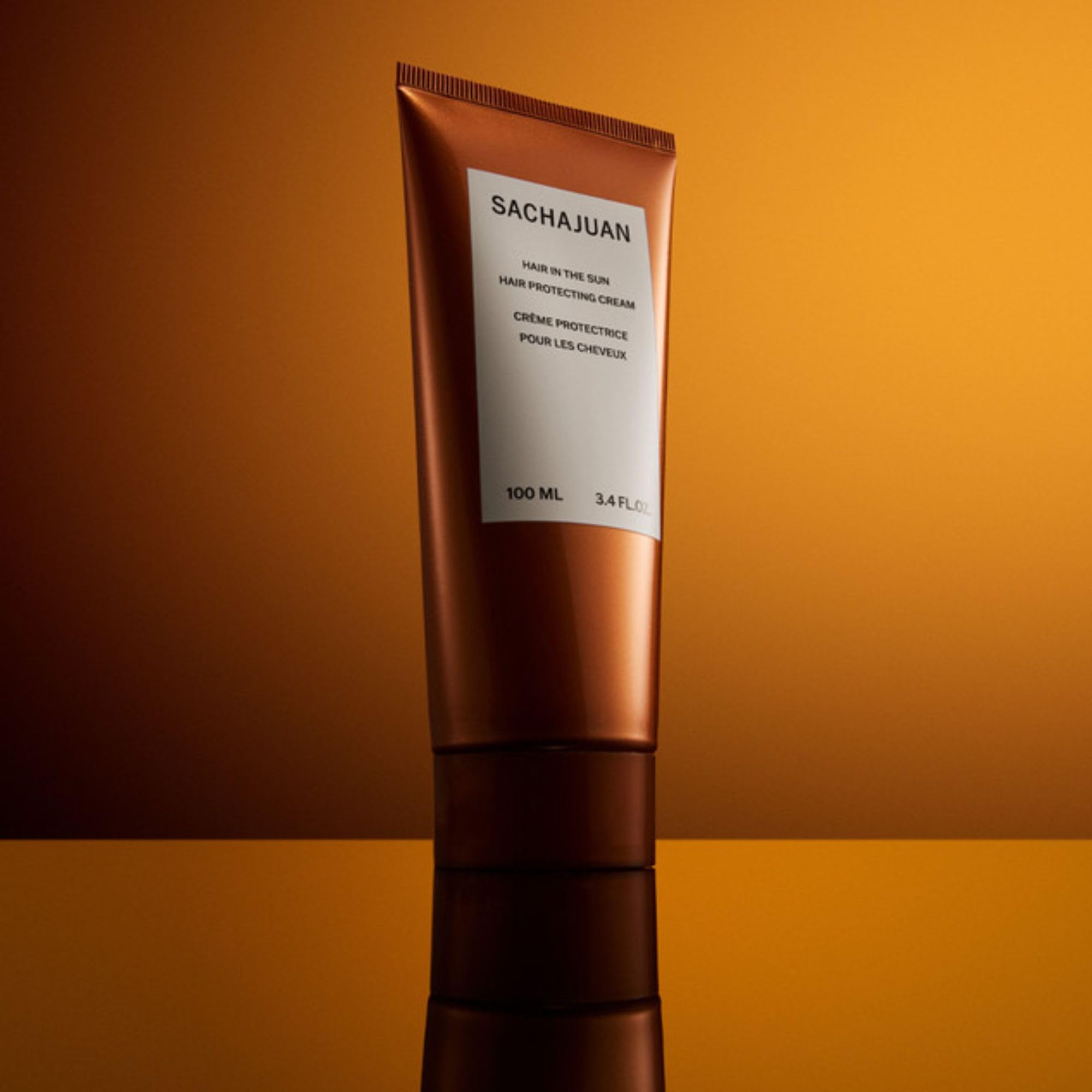 SACHAJUAN Hair In The Sun leave-in conditioner with UV protection, 3.4 oz, for nourishing and protecting sun-exposed hair.