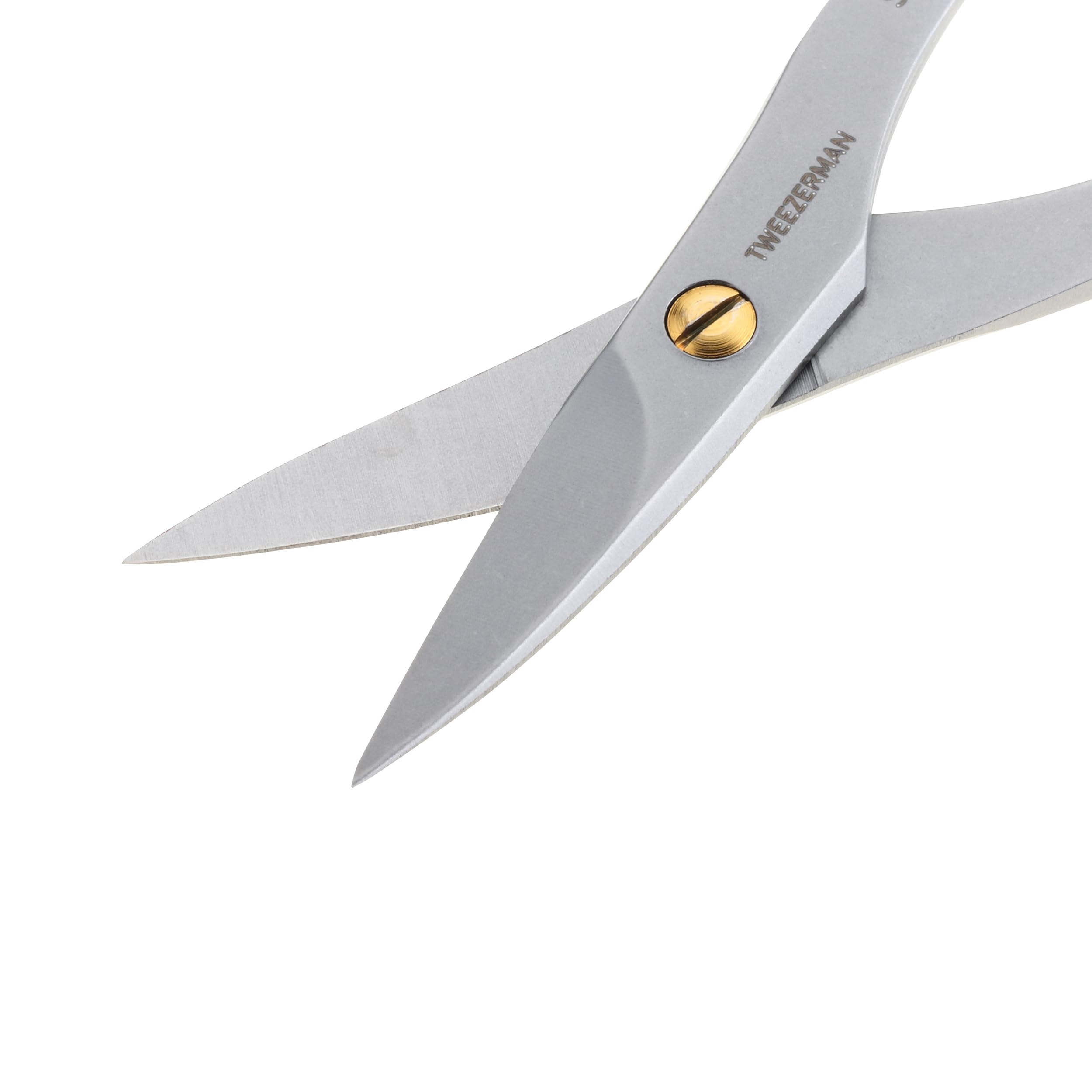 Tweezerman stainless steel nail scissors with precision cutting blades for grooming and nail care.