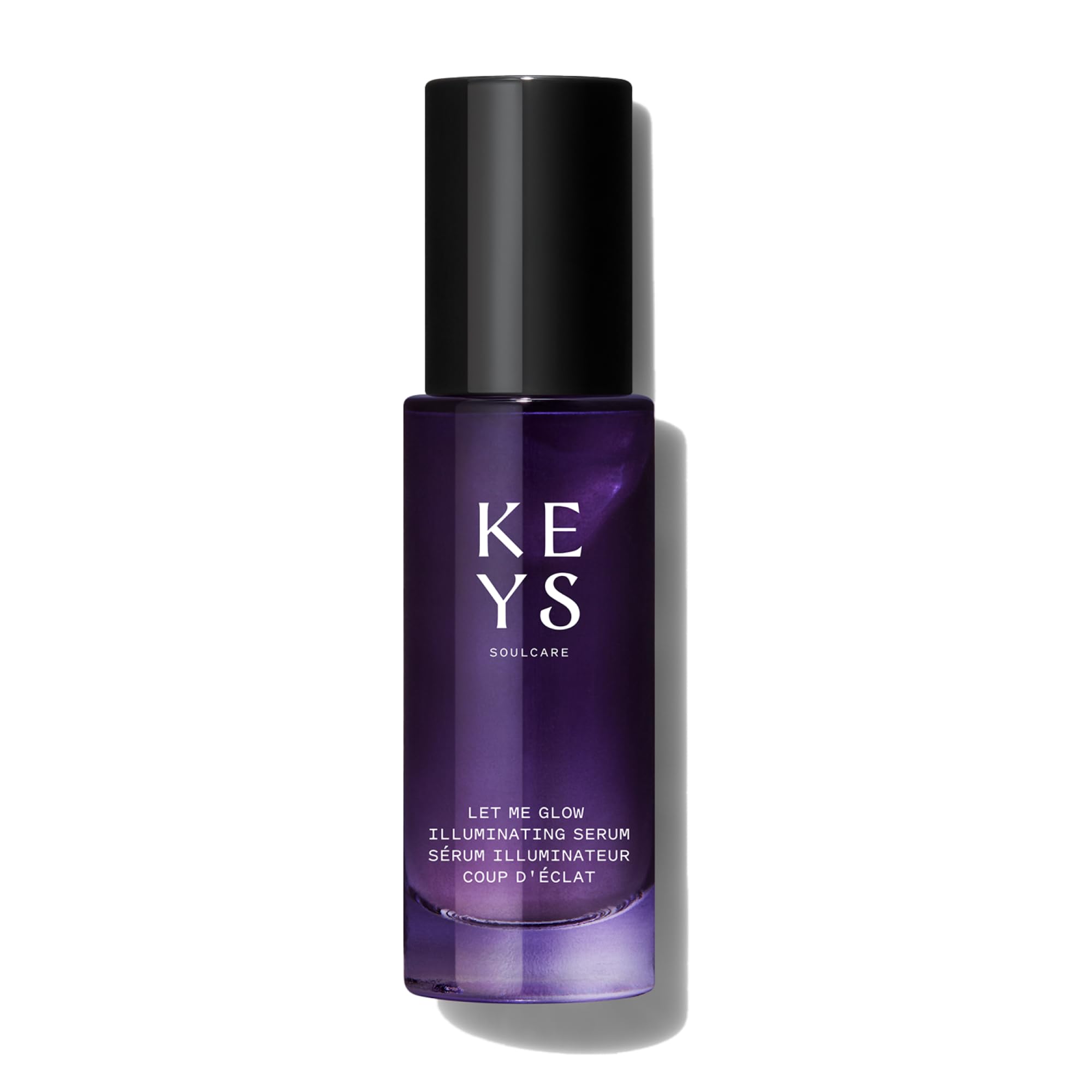 Keys Soulcare Let Me Glow Illuminating Serum and Primer in sleek bottle, highlighting radiant skin and smooth application.