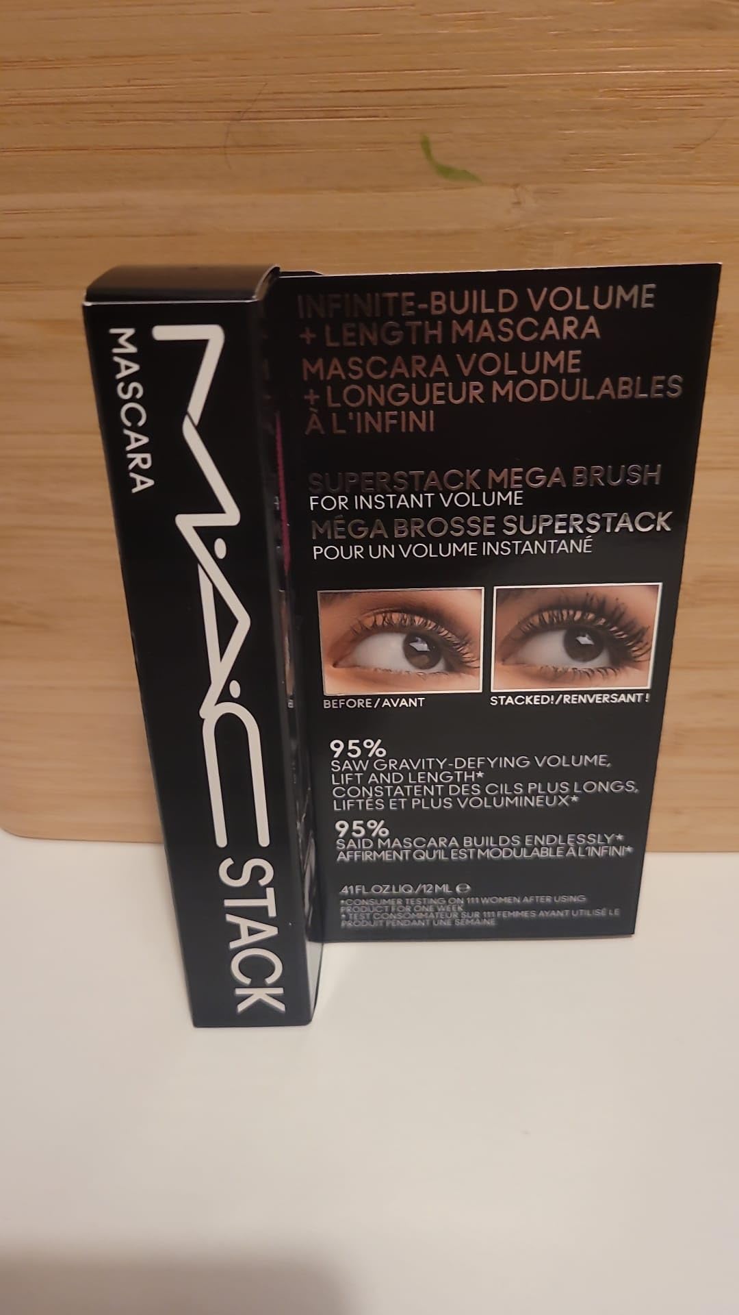 MAC MAC Stack Mascara with macro brush showing full brush applicator and black mascara on a white background.