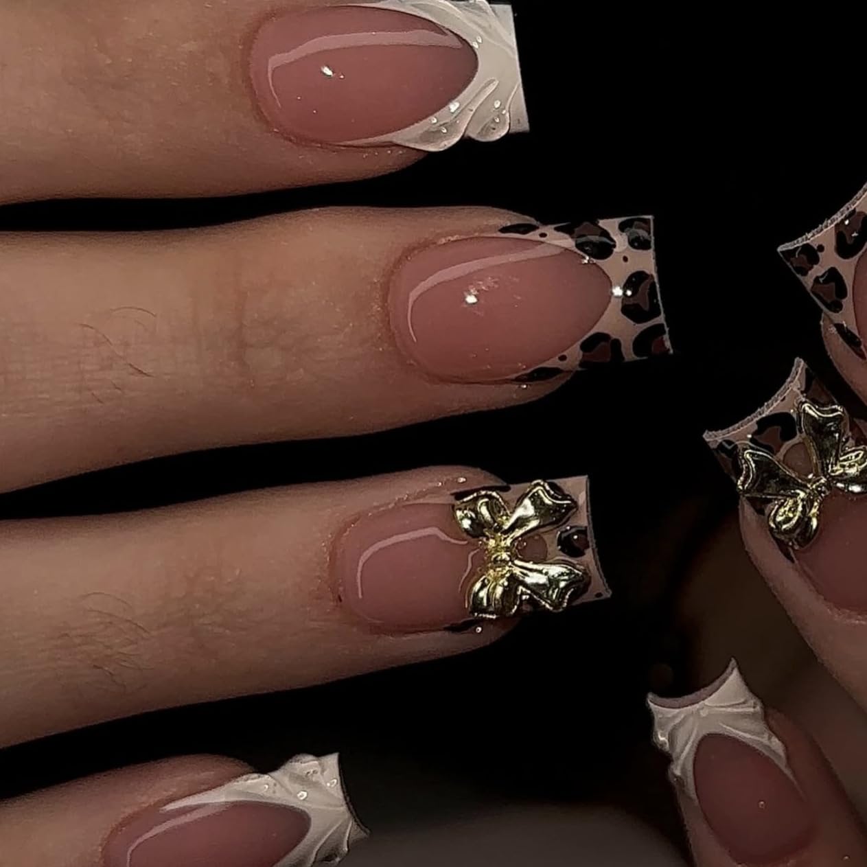 Medium square press on nails by PEPFTG with French tips, leopard print, 3D bows, glossy finish, reusable acrylic nail set for women.