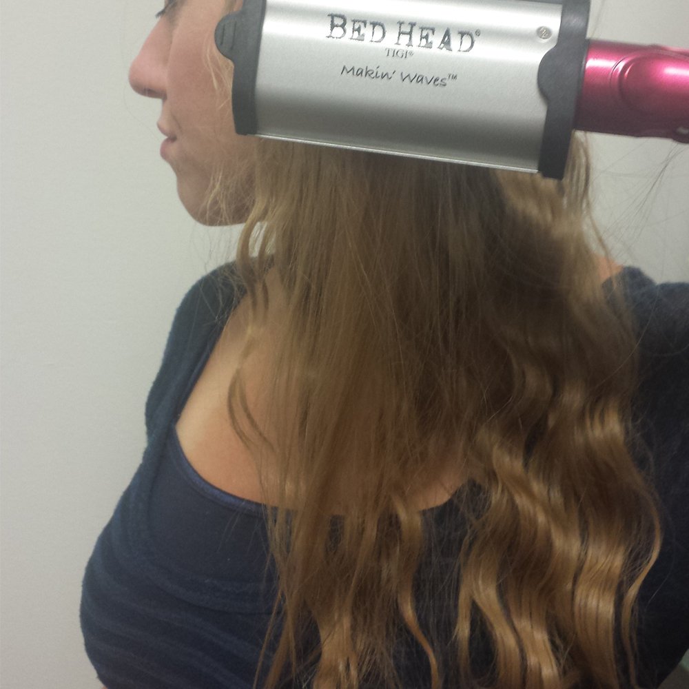 Bed Head Makin' Waves S Waver tourmaline ceramic hair iron showing sleek, wavy hair styling tool with ceramic plates.