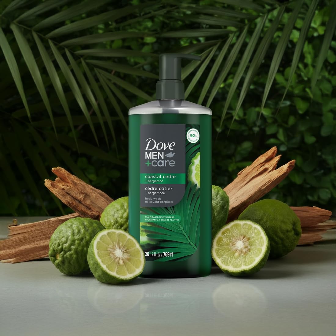 Dove Men+Care Coastal Cedar & Bergamot body wash in a 26oz bottle, showing the product label and packaging.