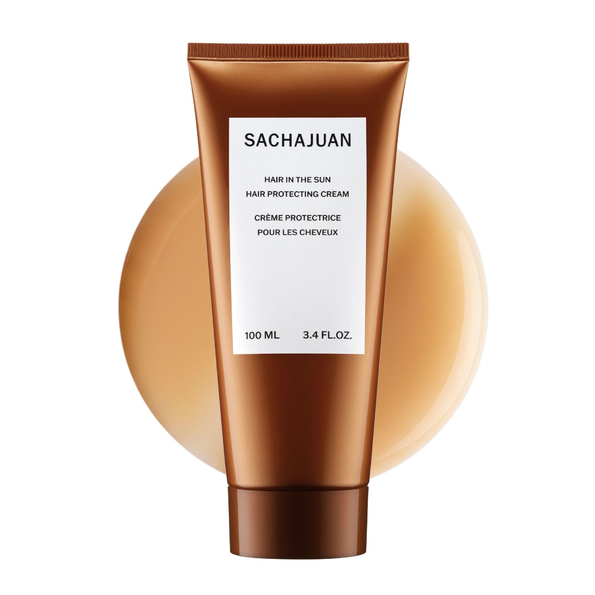 SACHAJUAN Hair In The Sun leave-in conditioner with UV protection in 3.4 oz bottle, designed for nourishing sun-exposed hair.