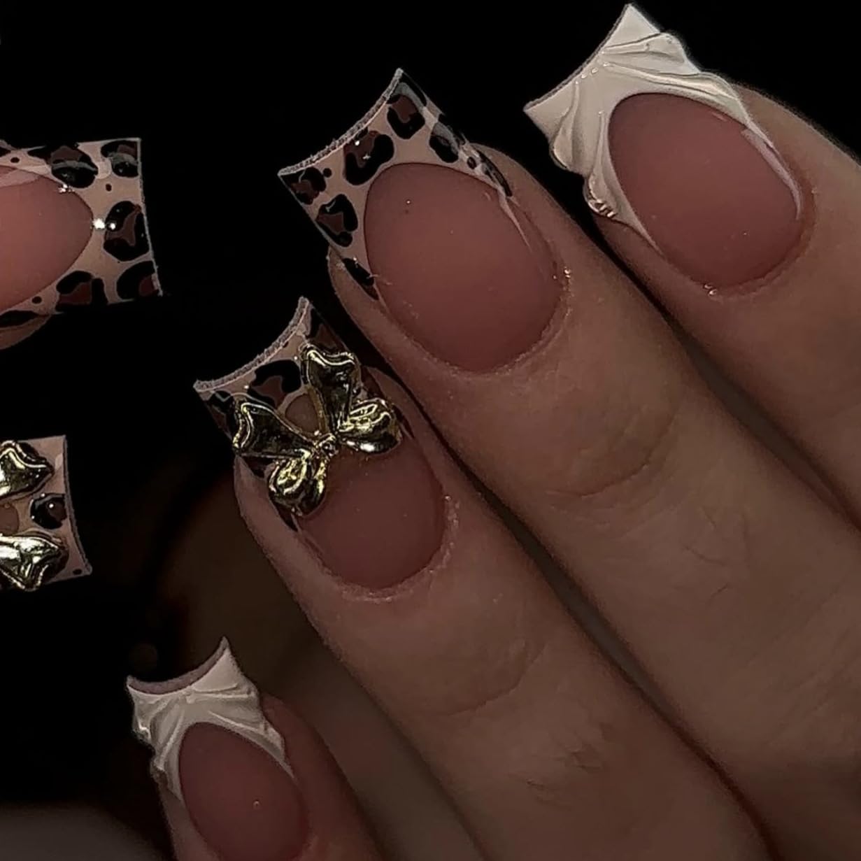 Medium square press on nails by PEPFTG with French tip, leopard print, 3D bows, glossy finish, reusable acrylic nail art for women.