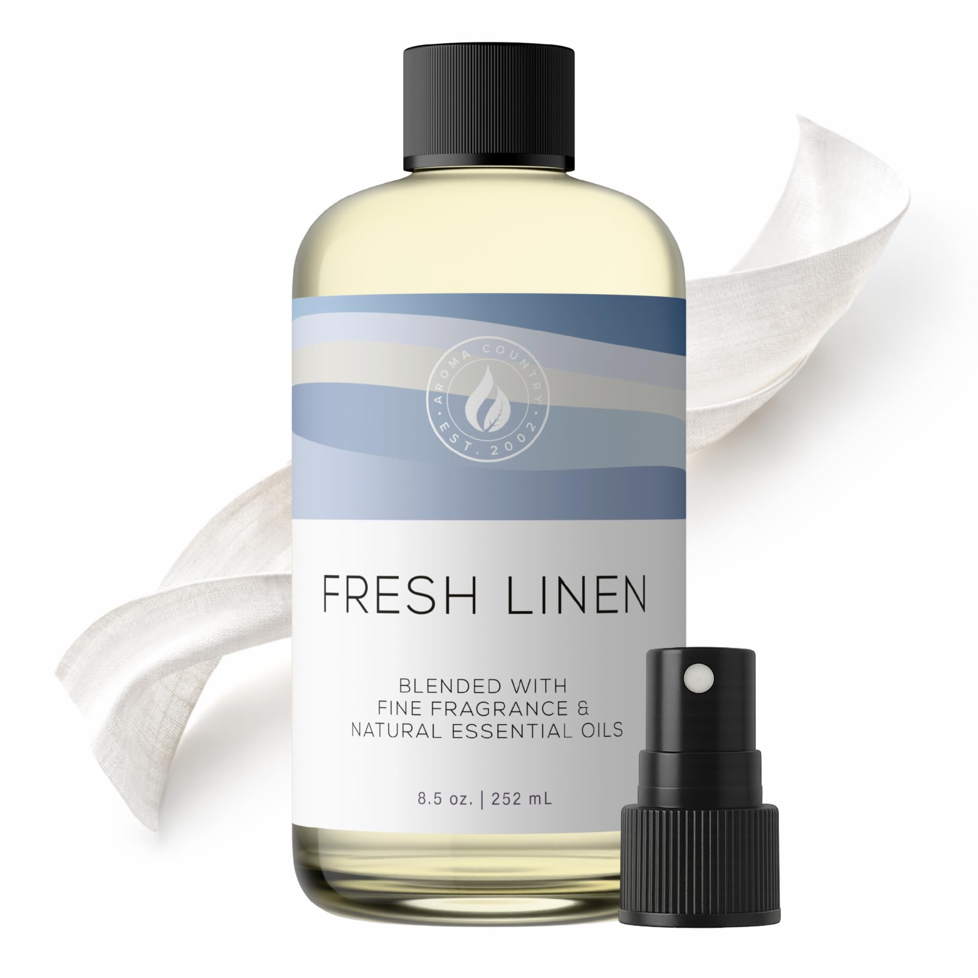 Aroma Country Fresh Linen diffuser oil refill in 8.5 oz bottle, essential oil with a clear label and natural linen scent.