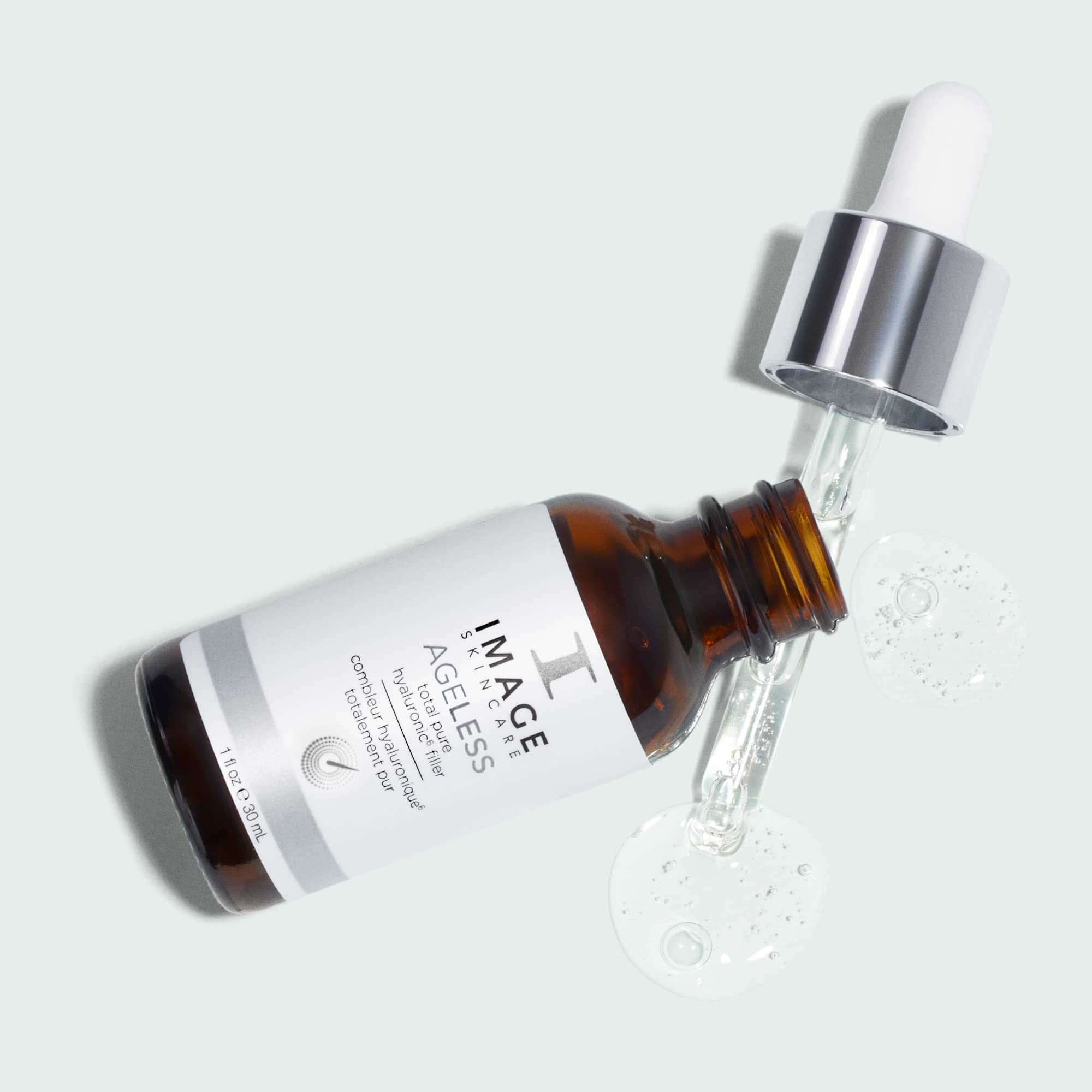 IMAGE Skincare AGELESS Total Pure Hyaluronic 6 Filler skin moisturizer in a 1 fl oz bottle, featuring clear, hydrating serum with dropper.
