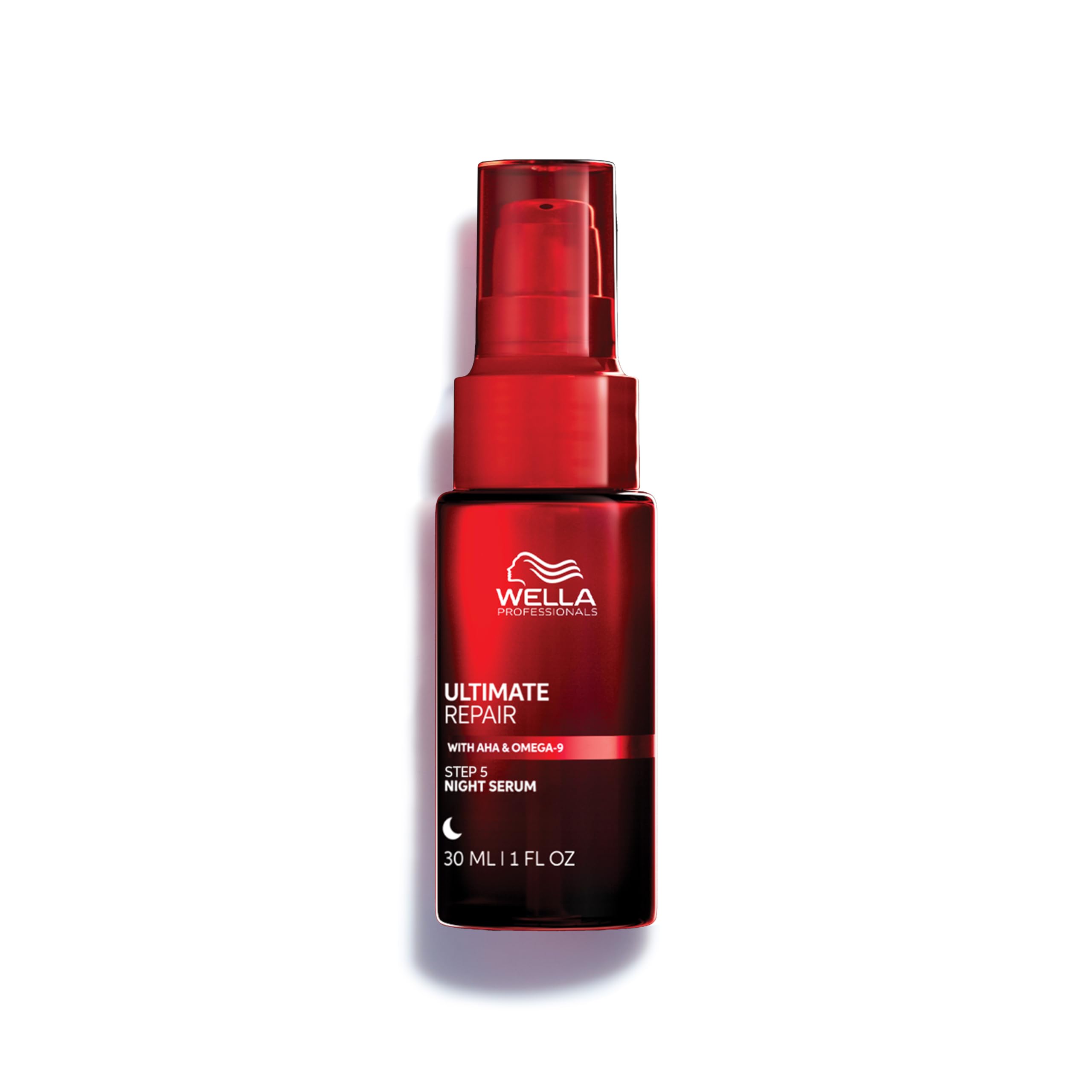 Wella Professionals Ultimate Repair Night Serum for hair, showing the sleek bottle and applicator tip for overnight treatment.