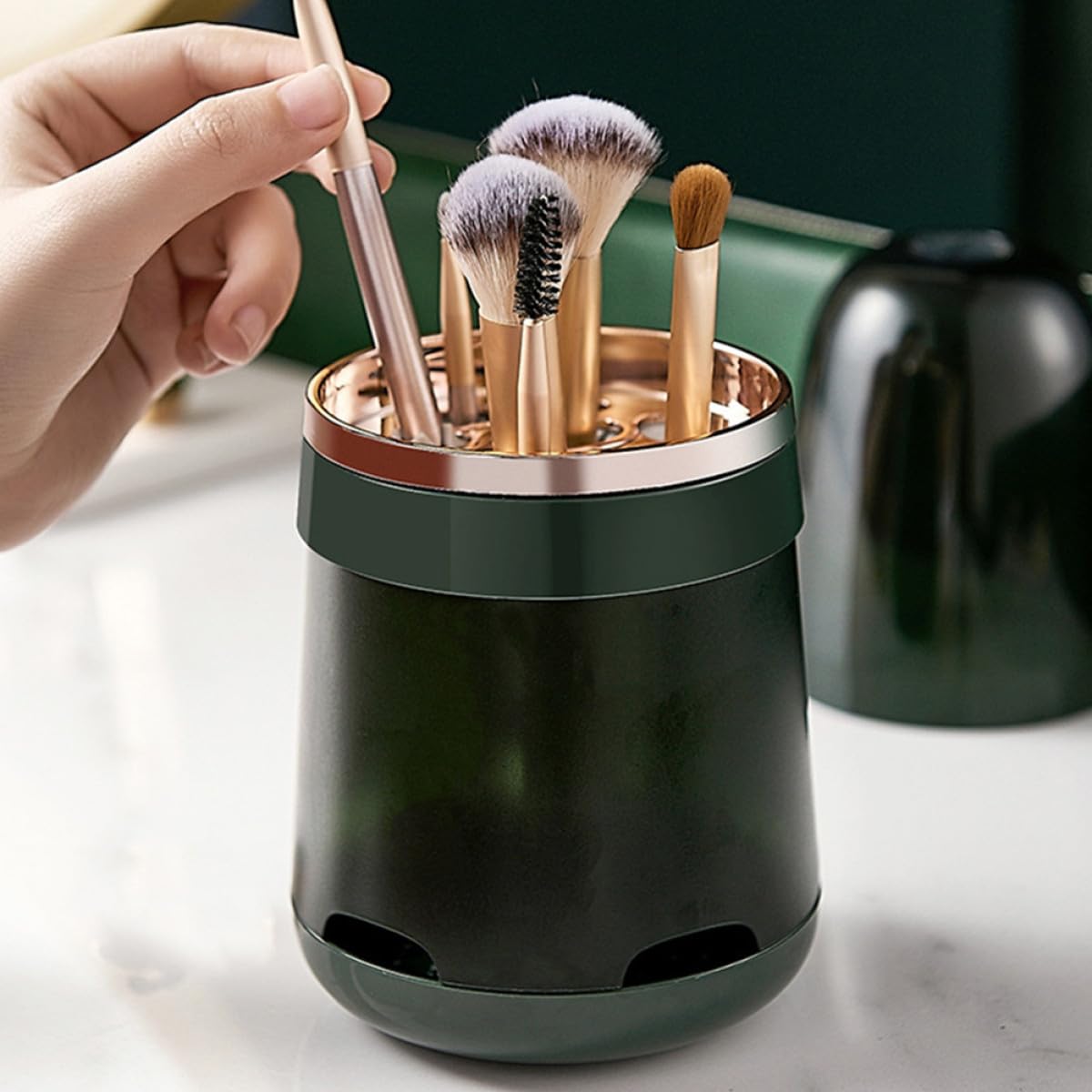 Round GOOHOCHY makeup brush holder caddy with ventilated dustproof design, portable for vanity, travel, and home use.
