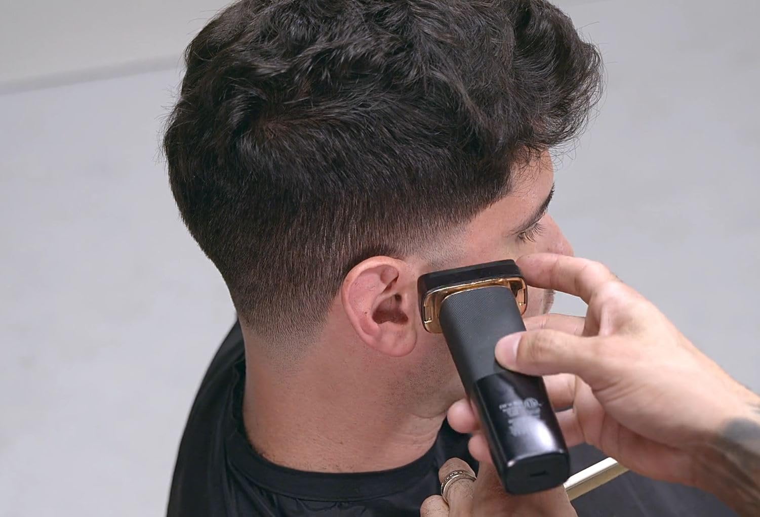 Andis Resurge replacement foil and cutter for electric shaver, suitable for wet and dry shaving, shown on a clean shaver head.
