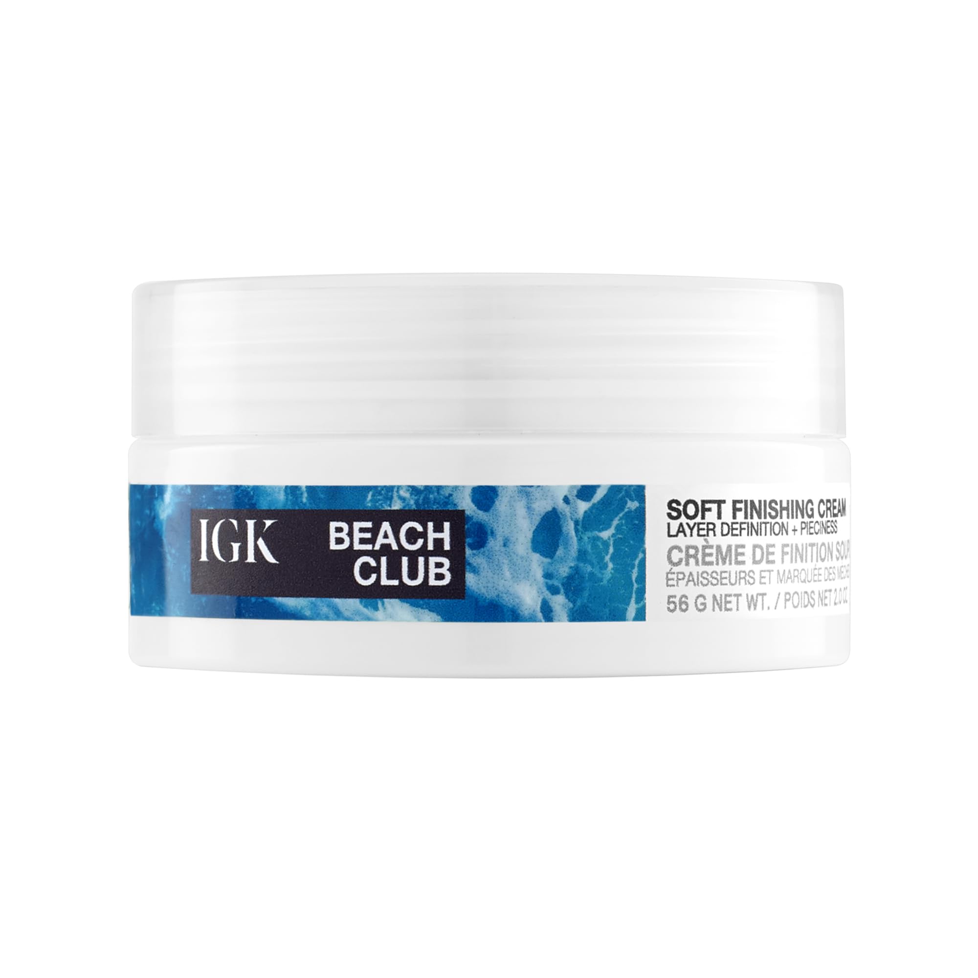 IGK Beach Club Soft Texture Paste 2 oz in a jar, showing its creamy vegan hair styling agent with a smooth, textured surface.
