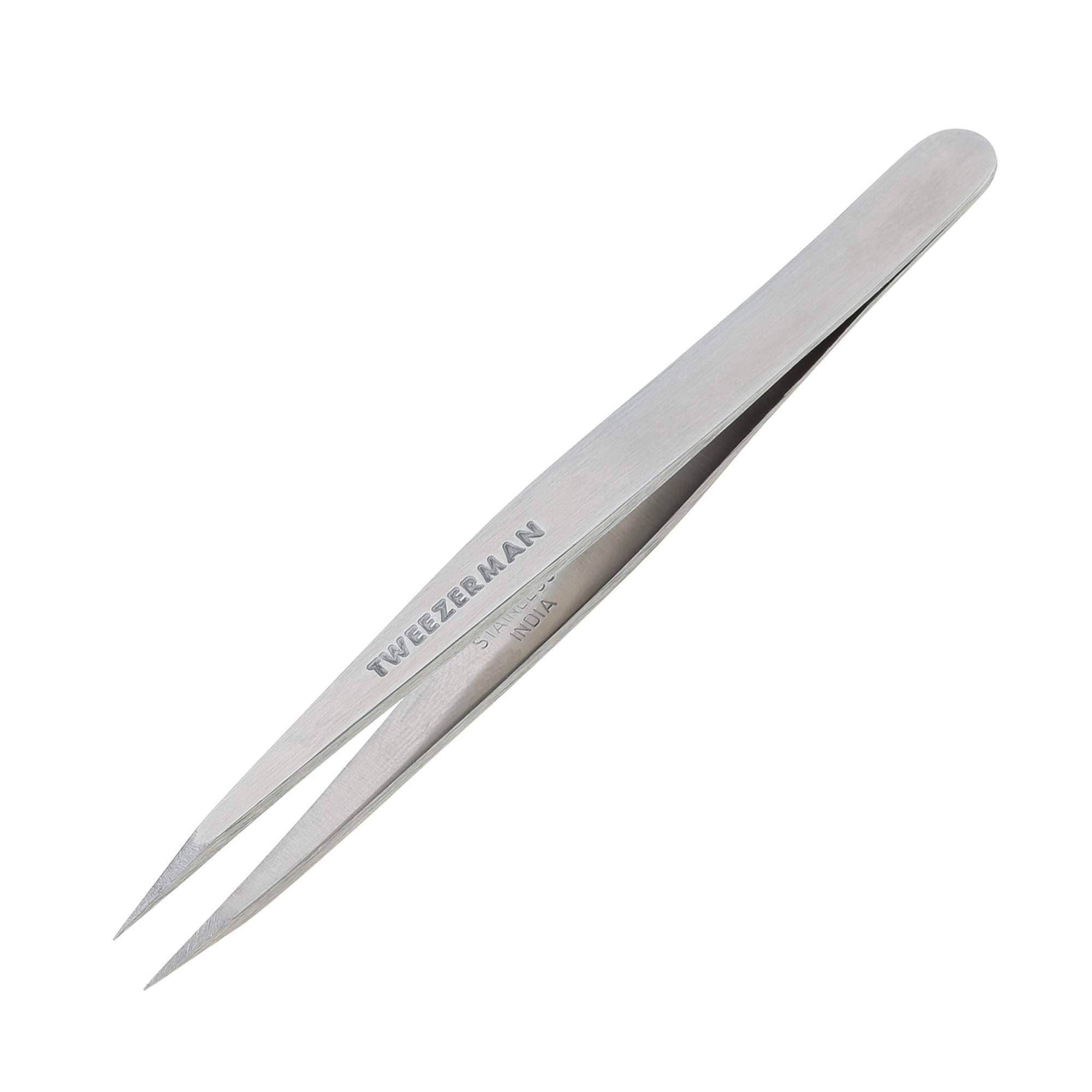 Colorful Tweezerman stainless steel point tweezer with precisely aligned tips for accurate hair and eyebrow plucking.