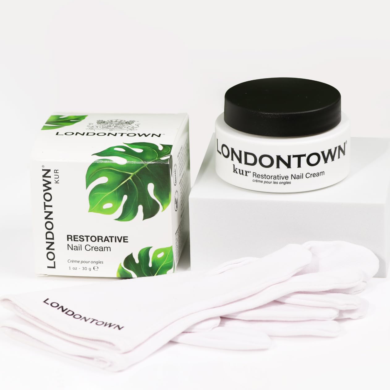 LONDONTOWN kur Restorative Nail Cream applied on nails, showcasing nourishing treatment for healthy, strengthened nails.
