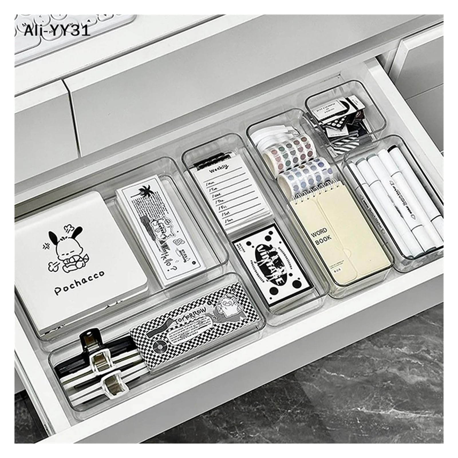 Stackable acrylic caddy with adjustable dividers for cosmetics and makeup storage, modular design for organized drawer organization.
