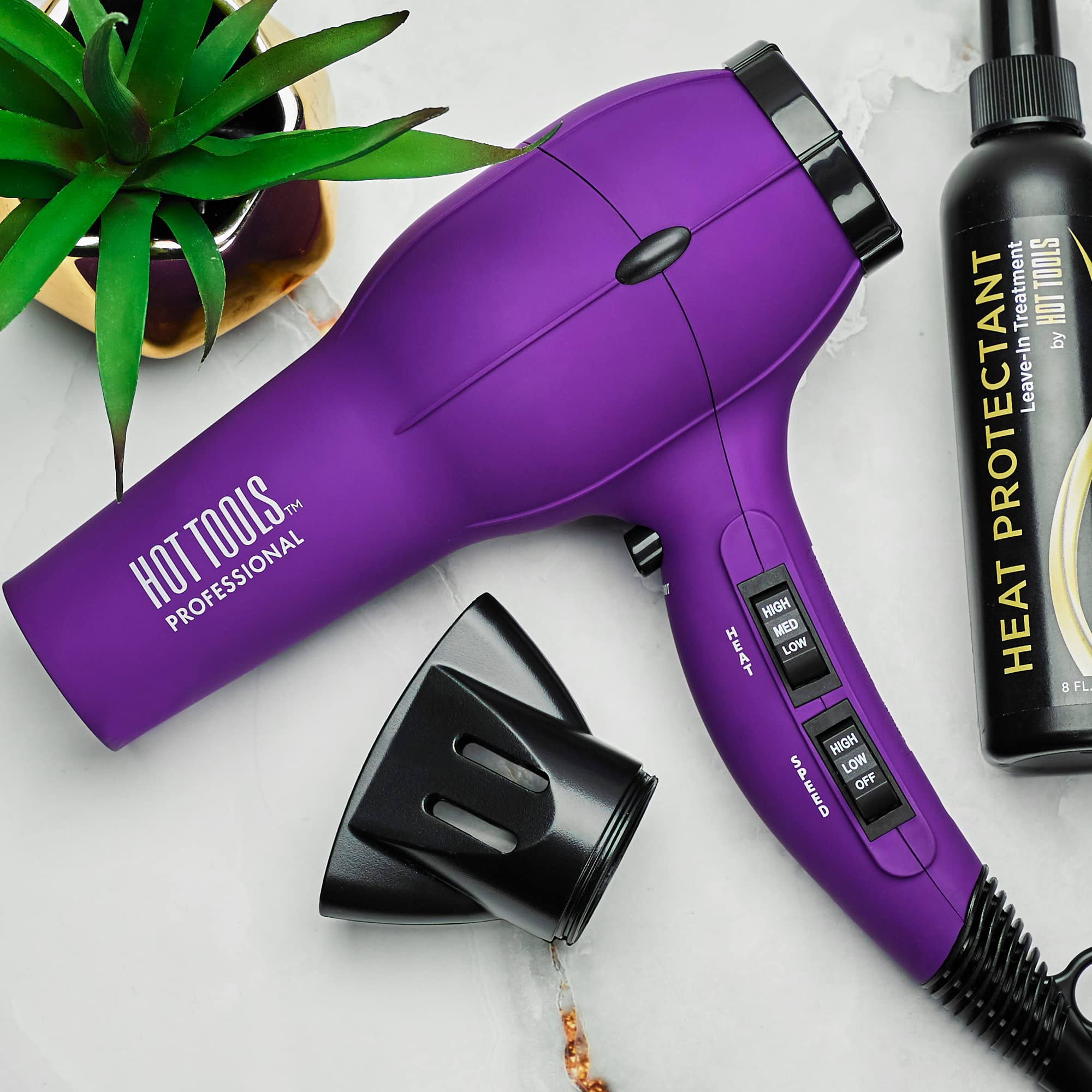 Purple Hot Tools Pro Artist 1875W Ionic Hair Dryer with professional design and ergonomic handle.