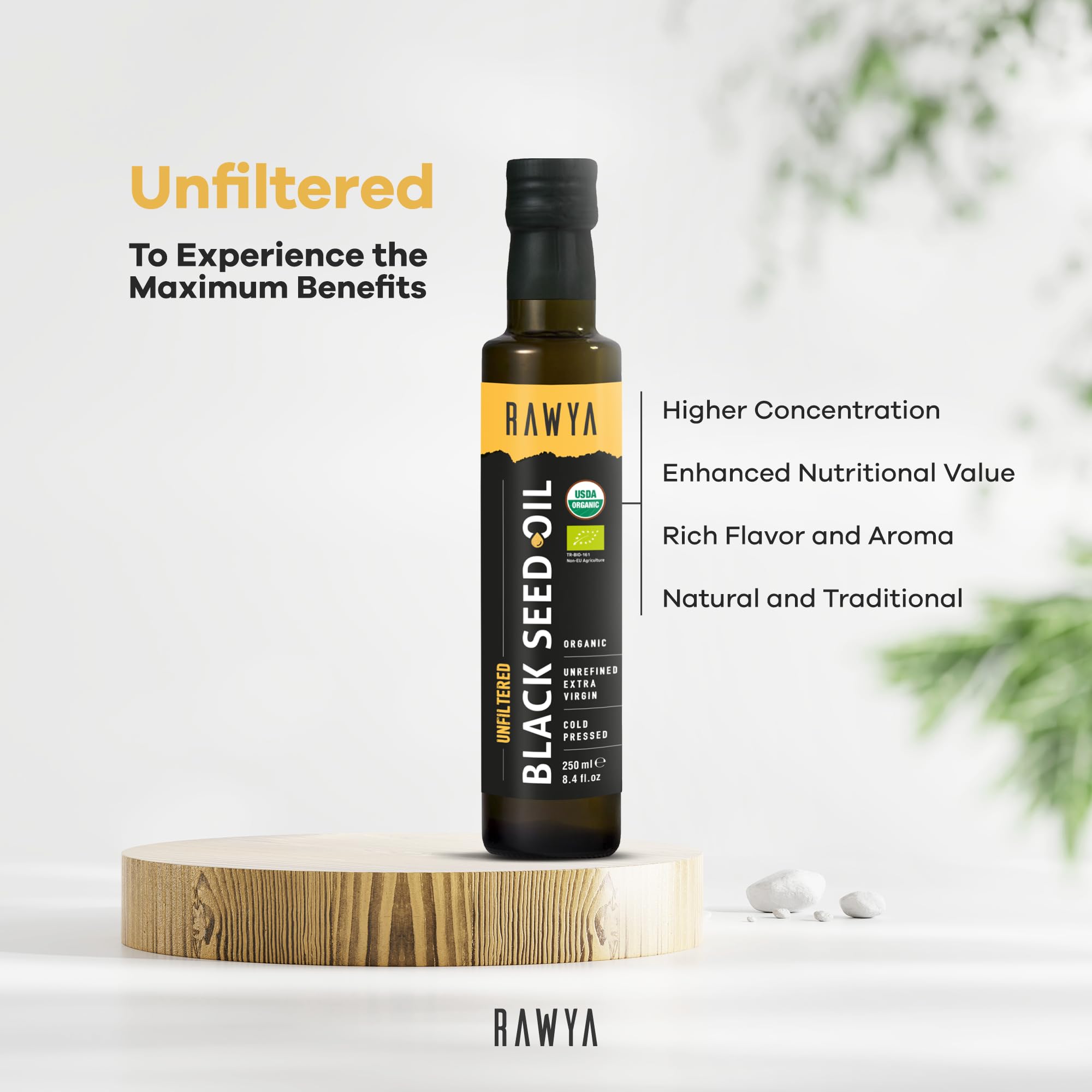 RAWYA black seed oil bottle, USDA organic, cold-pressed, unfiltered edible vegetable oil with black seed seeds in a clear glass bottle.