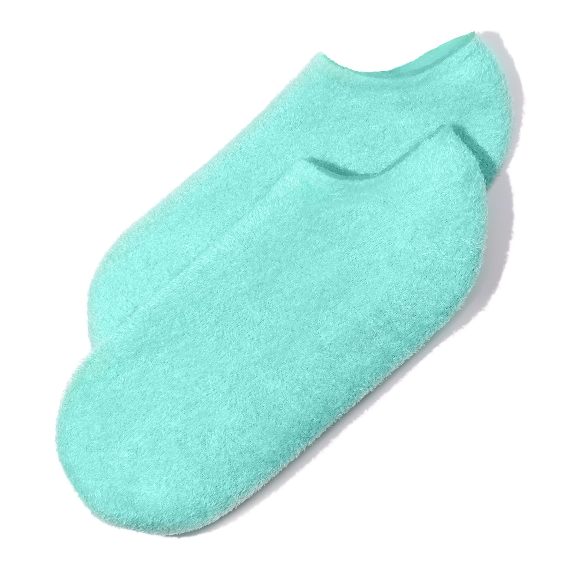 LONDONTOWN Pedi Perfect moisturizing spa socks with soft, plush material for nourishing foot treatment and hydration.