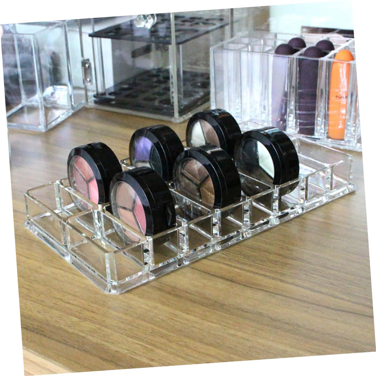 TEHAUX acrylic makeup display caddy with 16-grid double-row compact powder organizer for beauty care and vanity storage.