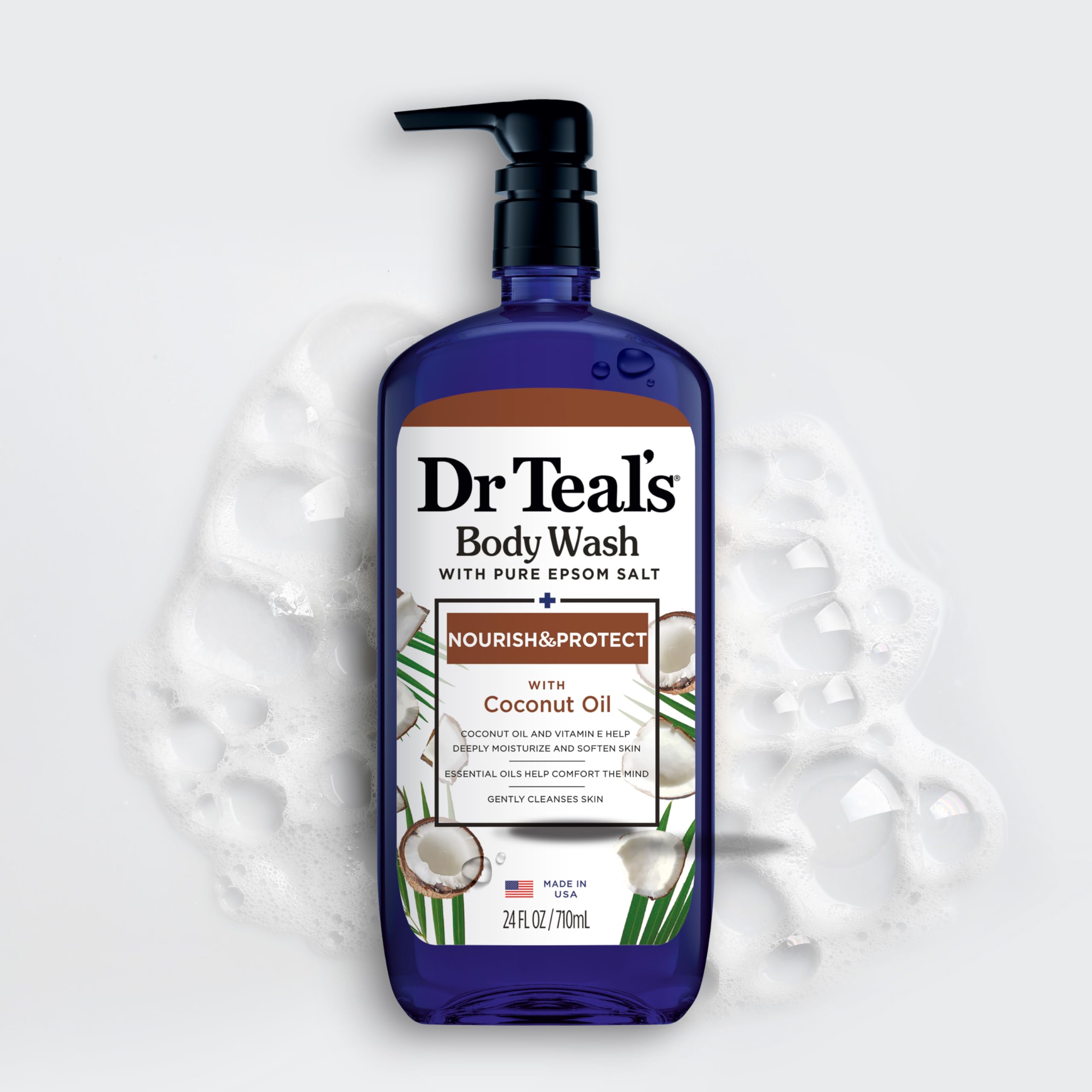 Dr Teal's body wash with pure Epsom salt and coconut oil in a 24 fl oz bottle, shown in a pack of four, for skin cleaning.
