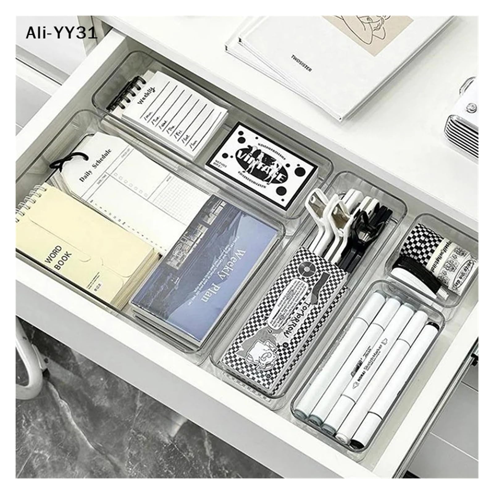 Stackable acrylic drawer organizer caddy with adjustable dividers, ideal for modular makeup and cosmetic storage.