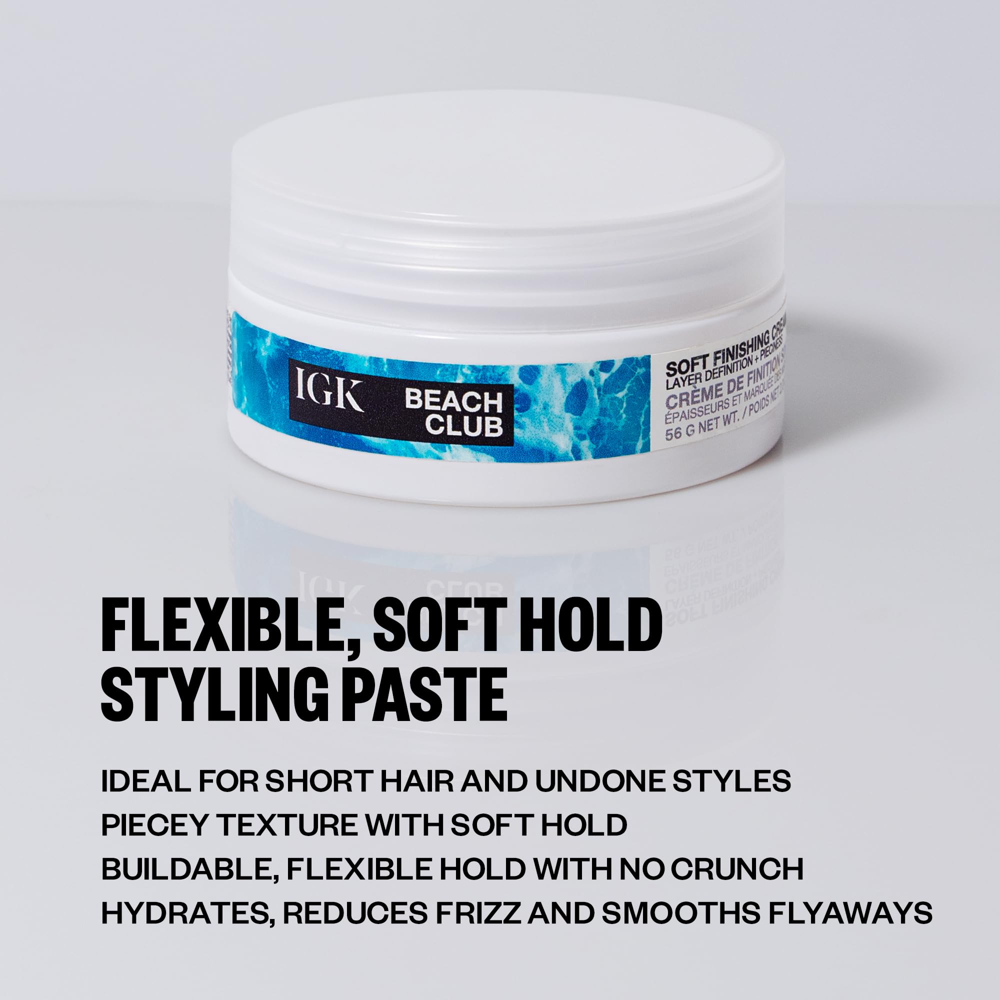 IGK Beach Club Soft Texture Paste 2 oz in a white jar, showcasing the vegan hair styling agent with a smooth, matte finish.