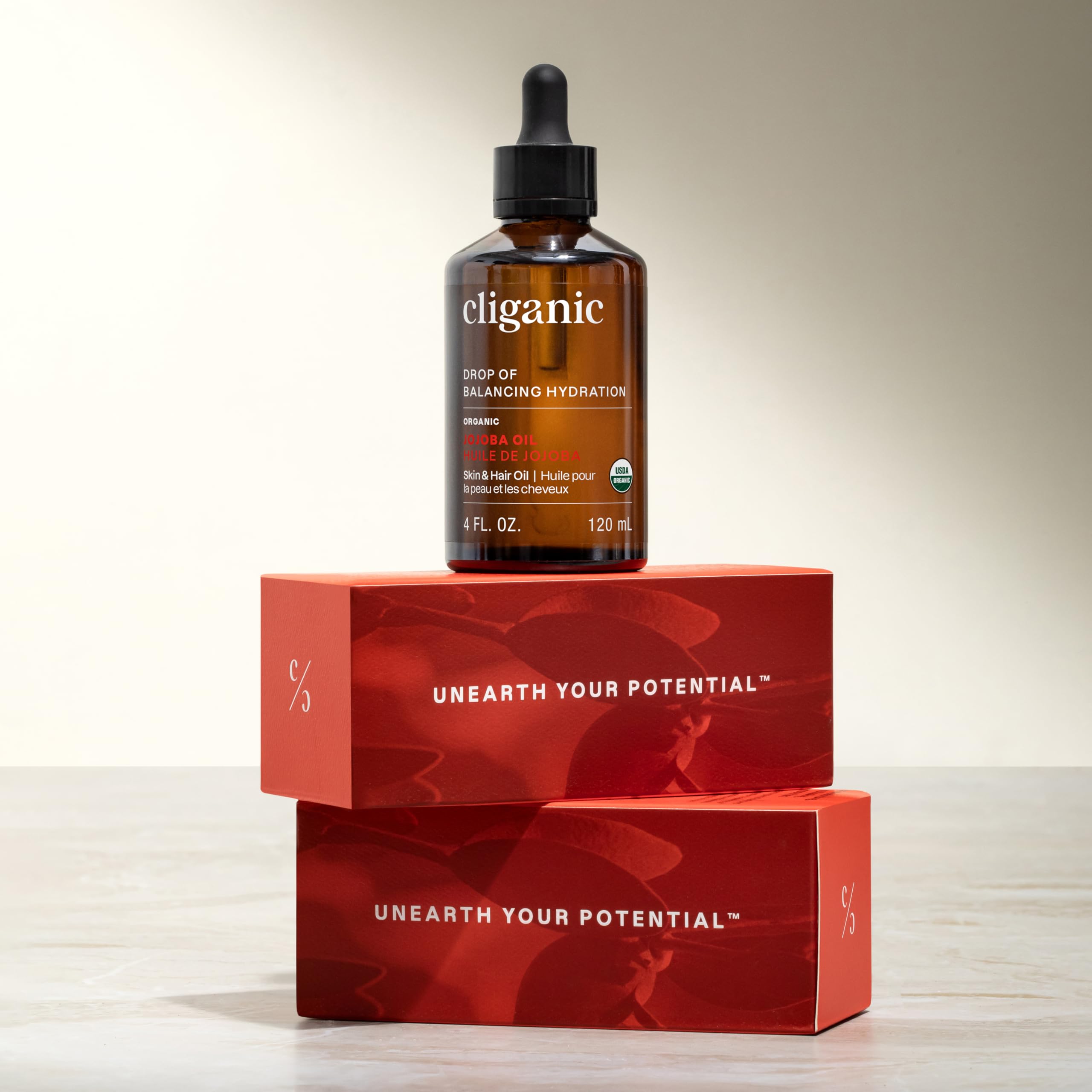 Cliganic Organic Jojoba Oil 100% pure 4oz bottle, natural skin moisturizer suitable for face and skincare routines.