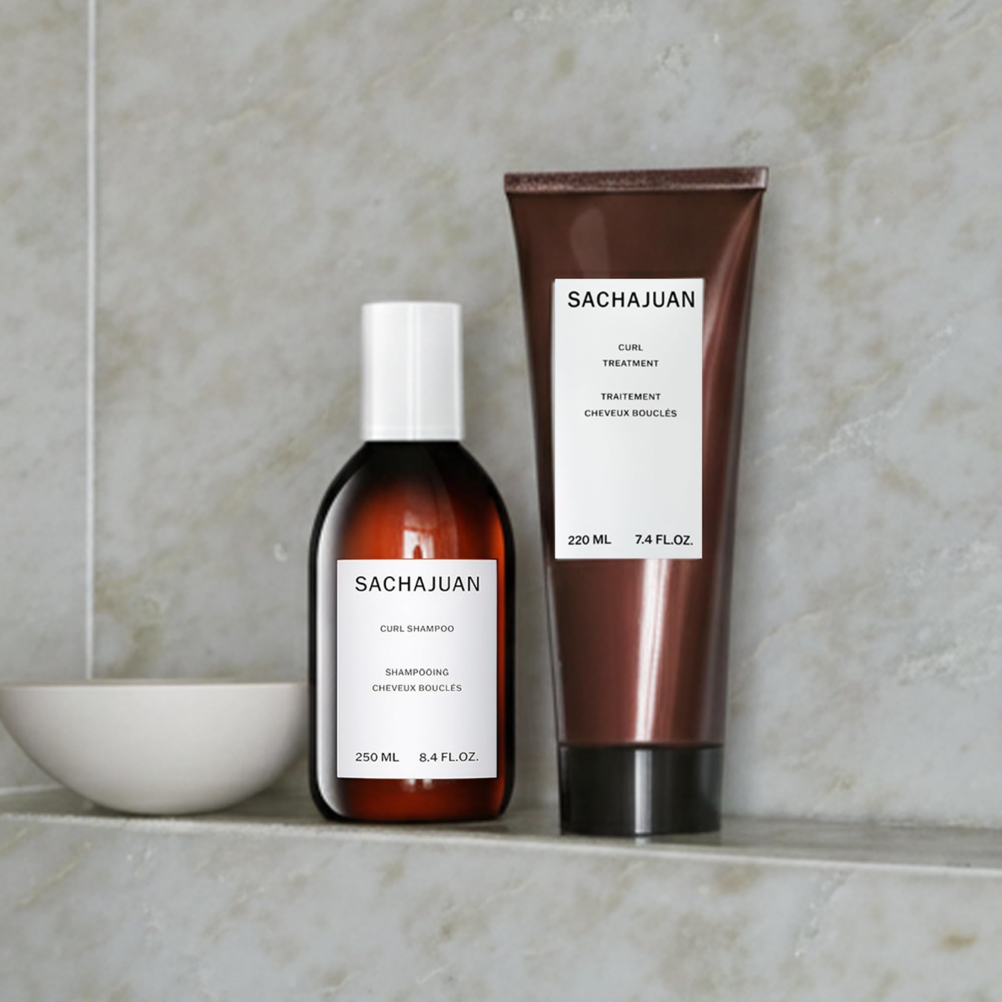 SACHAJUAN Curl Shampoo bottle, 8.4 oz, designed for frizz control and defining curly hair with a sleek packaging.