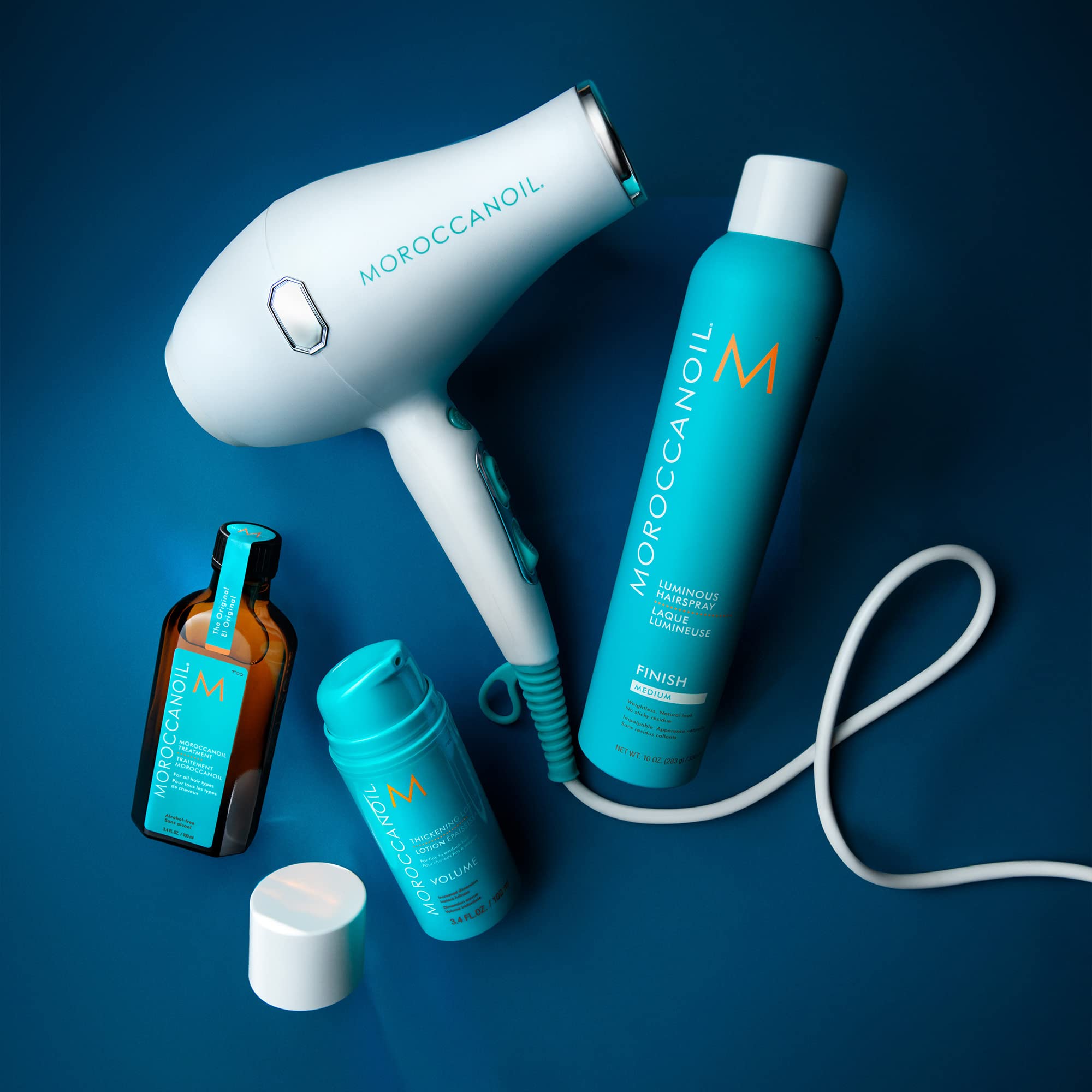 Moroccanoil Thickening Lotion in 3.4 oz bottle, a hair styling agent with argan oil for added volume and thickening.