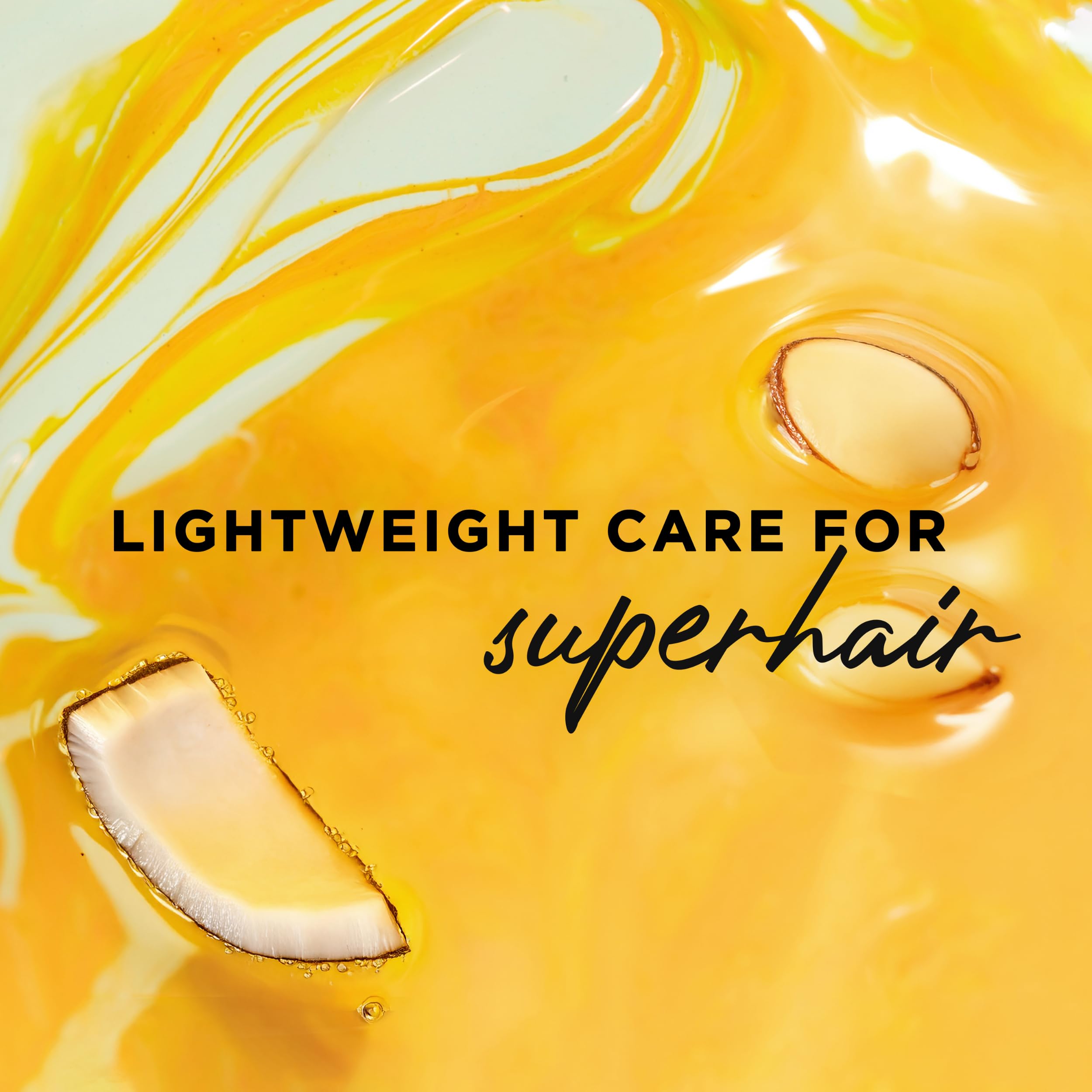 Hair Food Coconut & Argan Oil Heat Protectant Spray bottle, 6.4 fl oz, with a pump dispenser and tropical fruit imagery