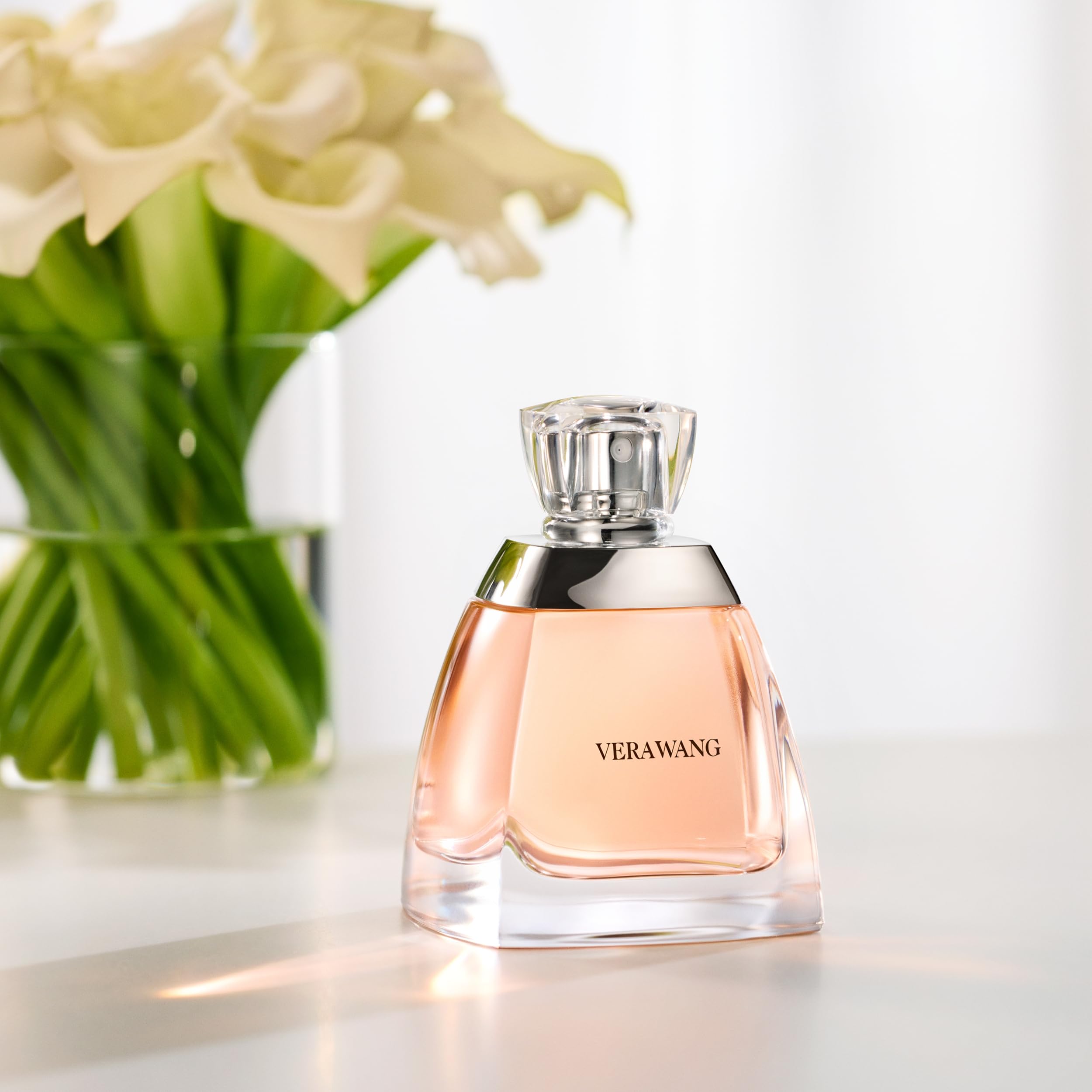Vera Wang Eau de Parfum 3.4oz bottle, women's fragrance with elegant floral design and clear glass showcasing the perfume inside.