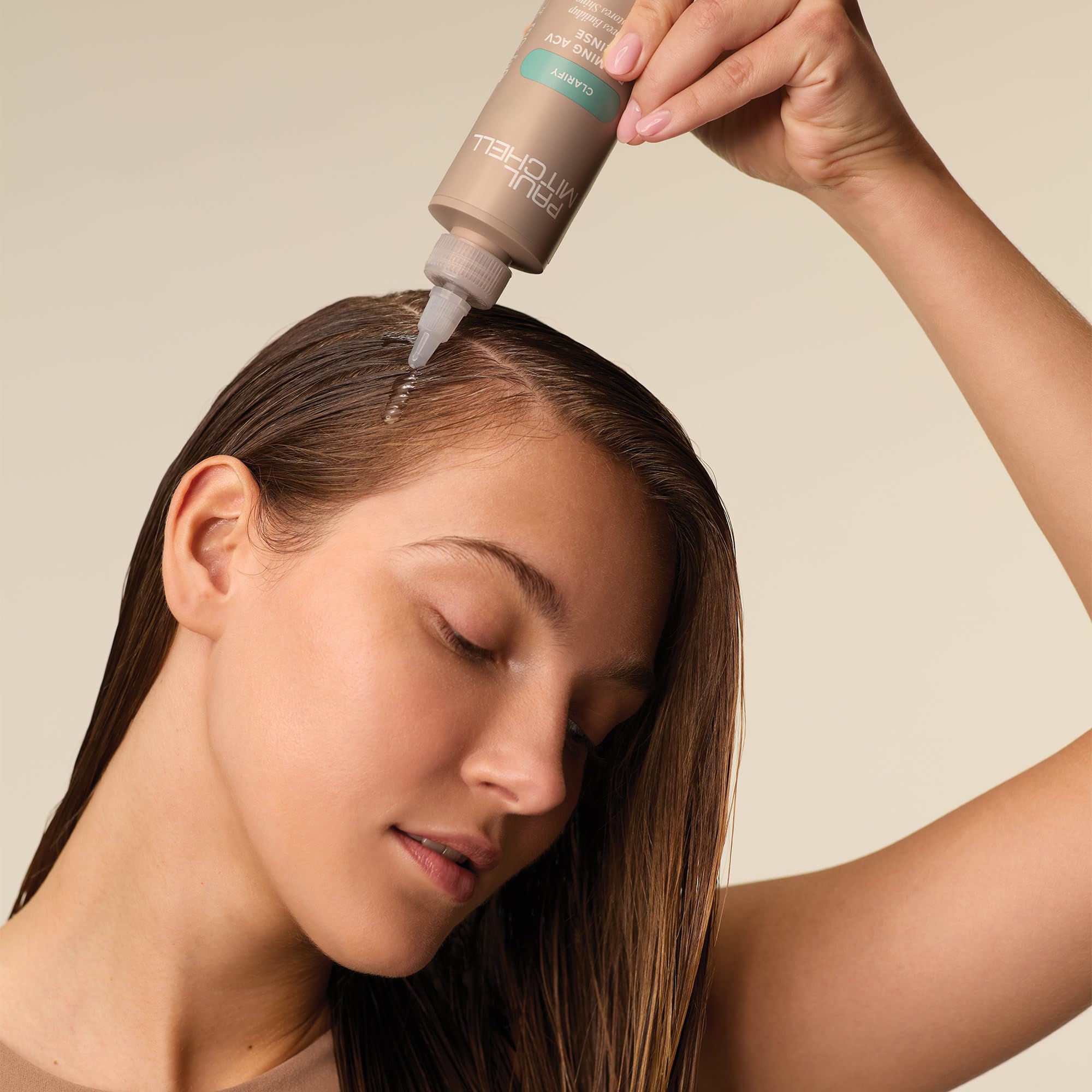 Paul Mitchell Foaming ACV Rinse shampoo in 5.1 fl oz bottle, suitable for all hair types, with a foaming, apple cider vinegar formula