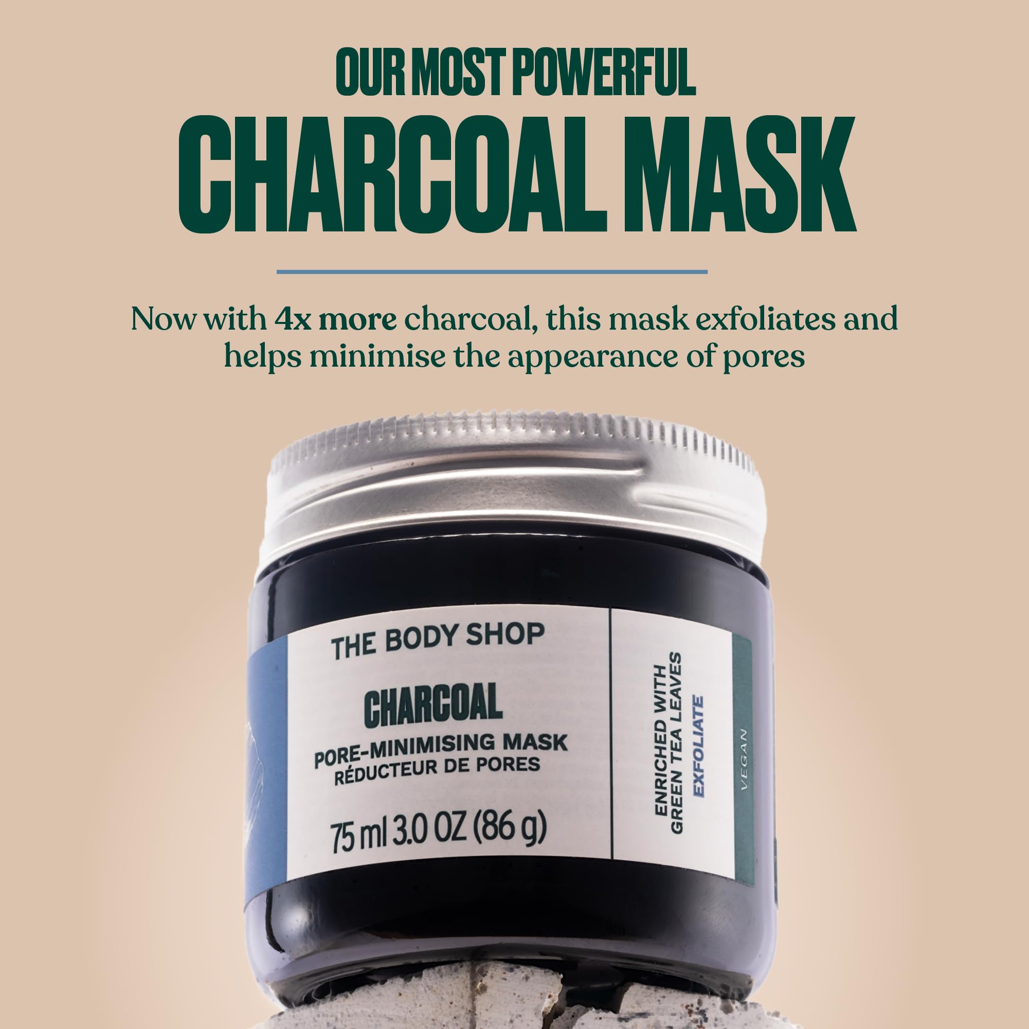 The Body Shop Charcoal Pore-Minimizing Clay Mask in a 75ml jar, featuring black clay and soothing ingredients for clear skin.