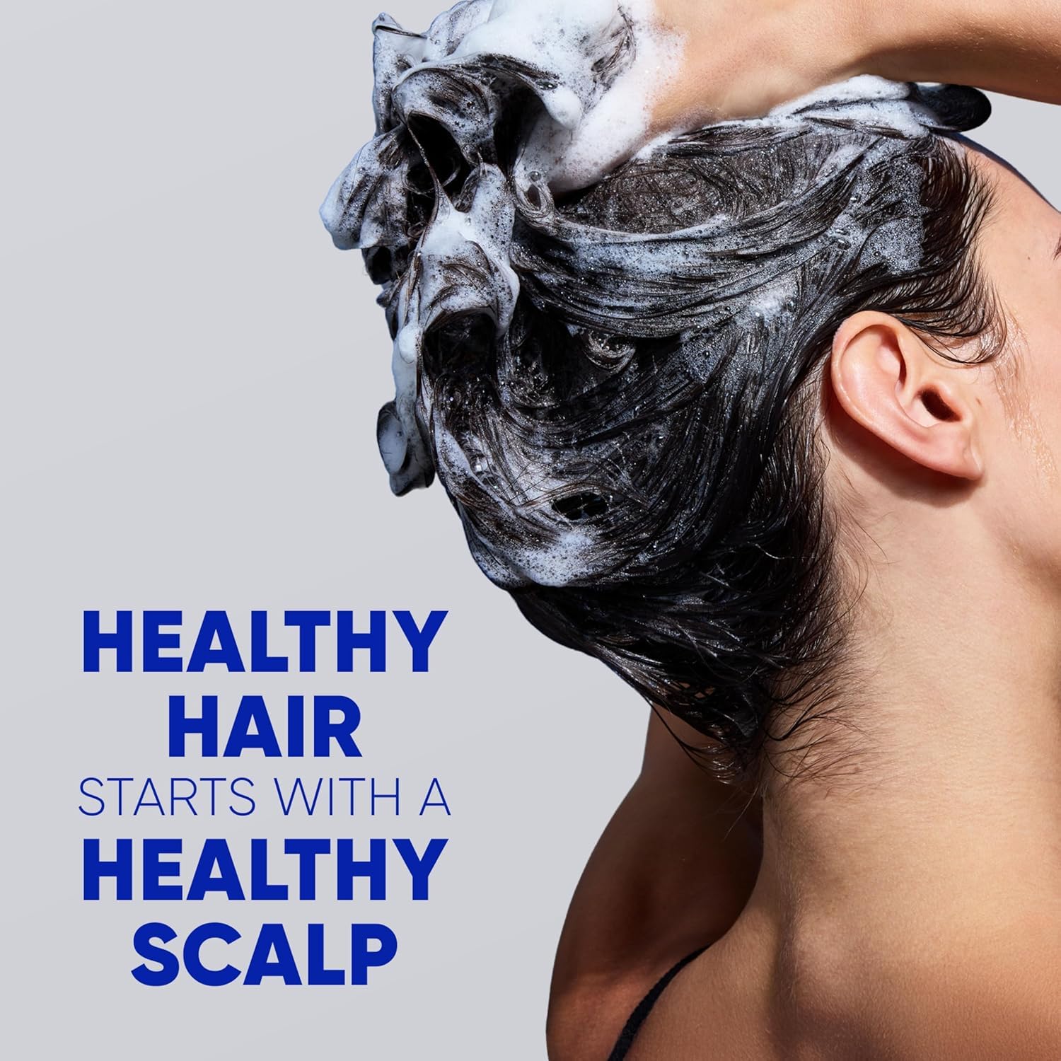 Head & Shoulders Classic Clean Shampoo 28.2 fl oz bottle with white label and blue cap, shown from a front view.