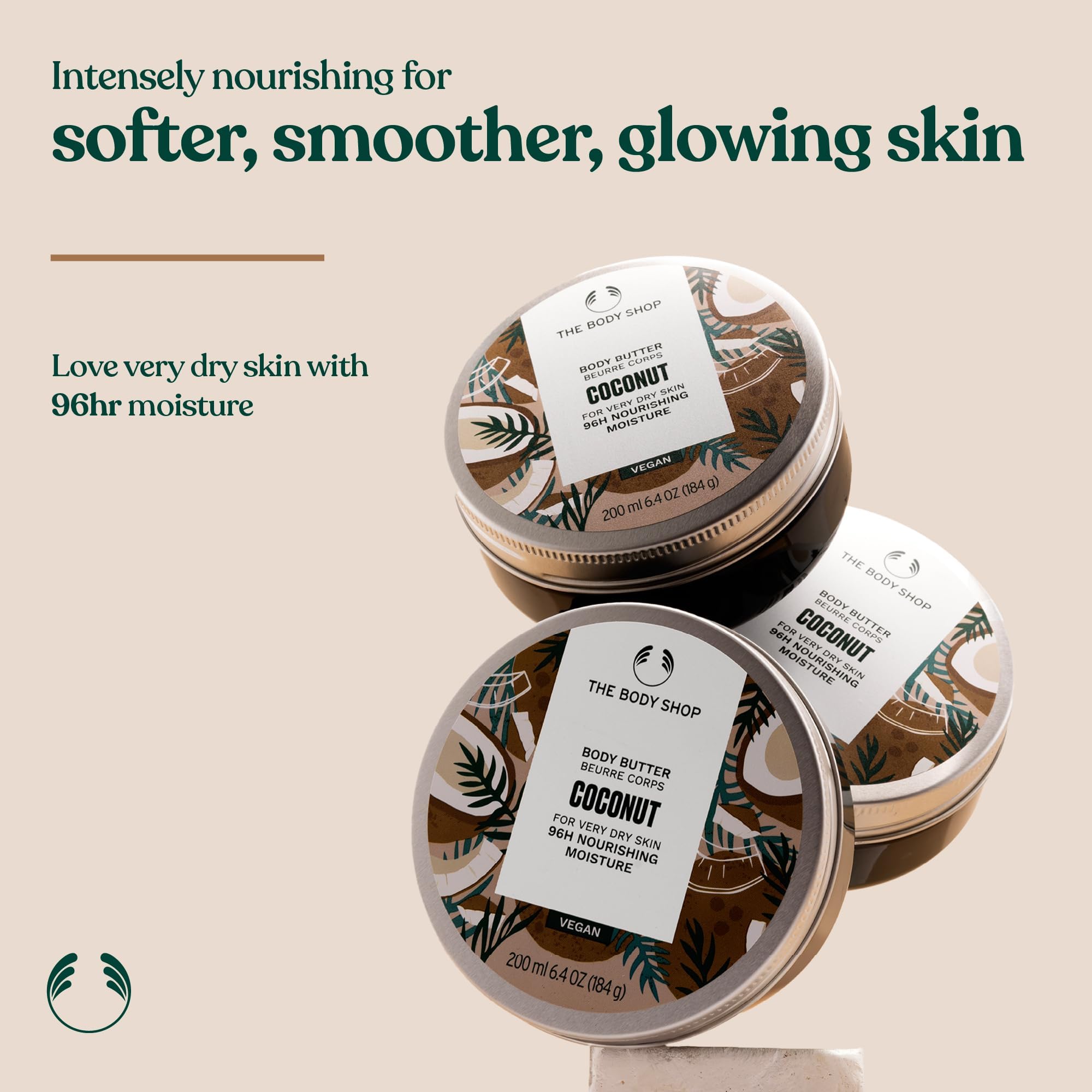 The Body Shop Coconut Body Butter jar showing the creamy moisturizer for dry skin, with coconut scent and 6.4 oz size.