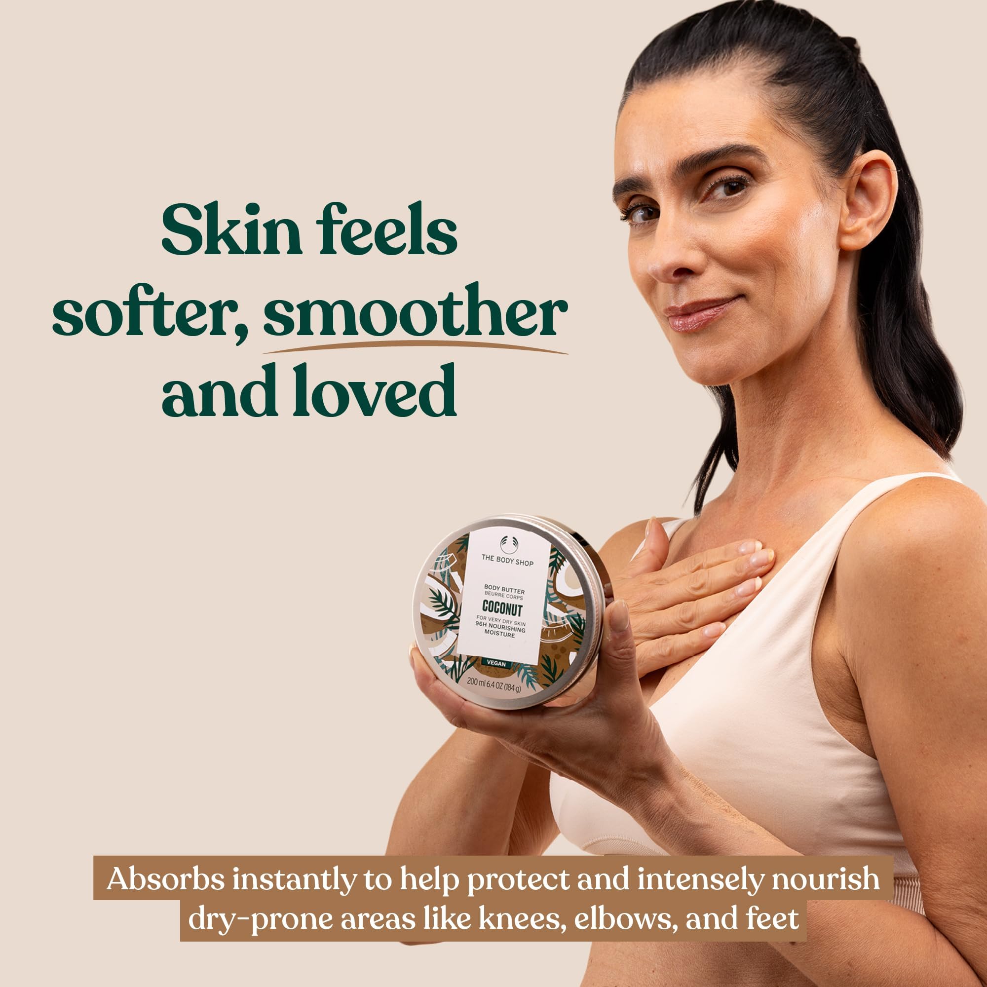 The Body Shop Coconut Body Butter in a 6.4 oz jar, showing creamy texture and coconut scent for long-lasting moisture.