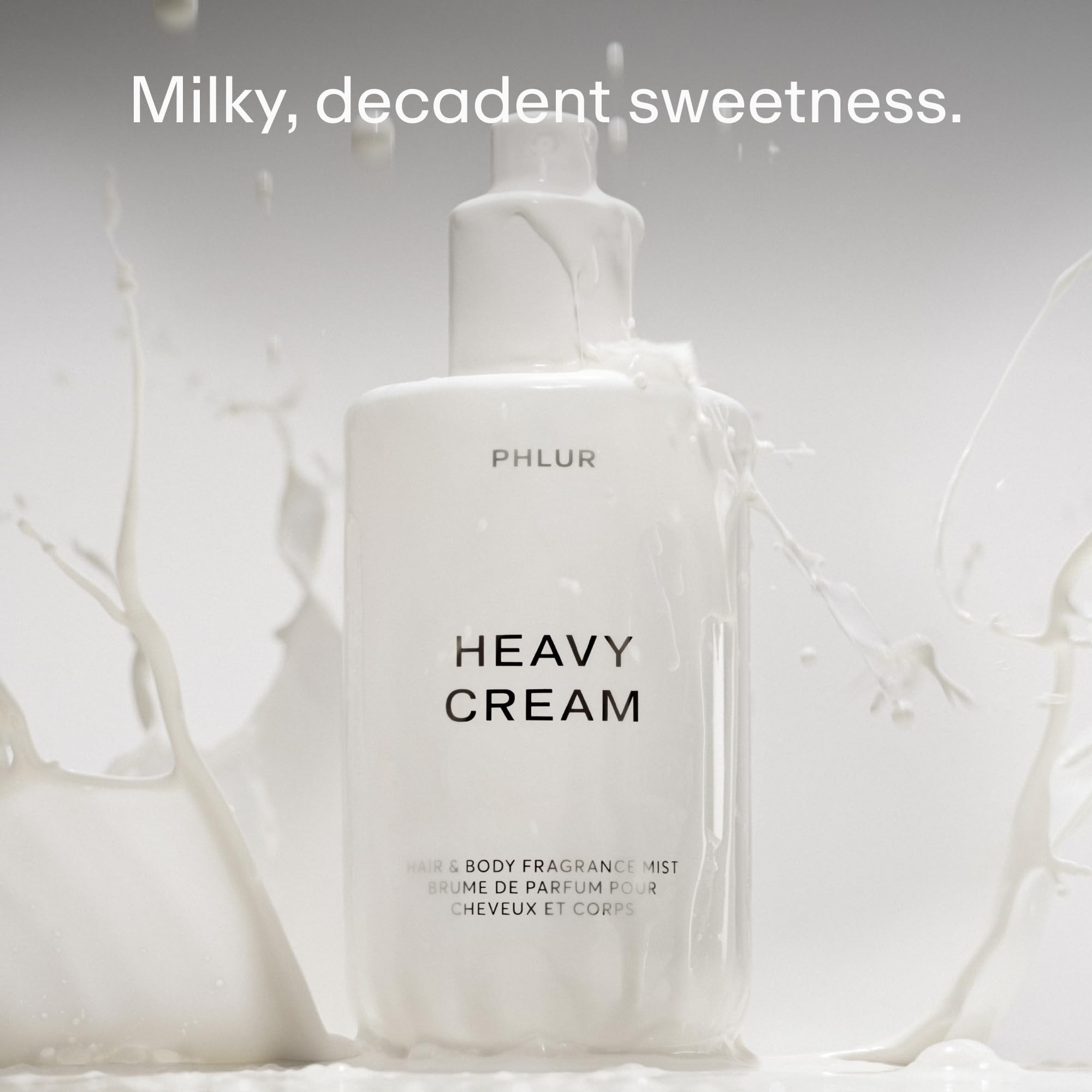 PHLUR Heavy Cream Body Mist 8 Fl Oz, a personal fragrance with a creamy scent for hair and body, shown in the image.
