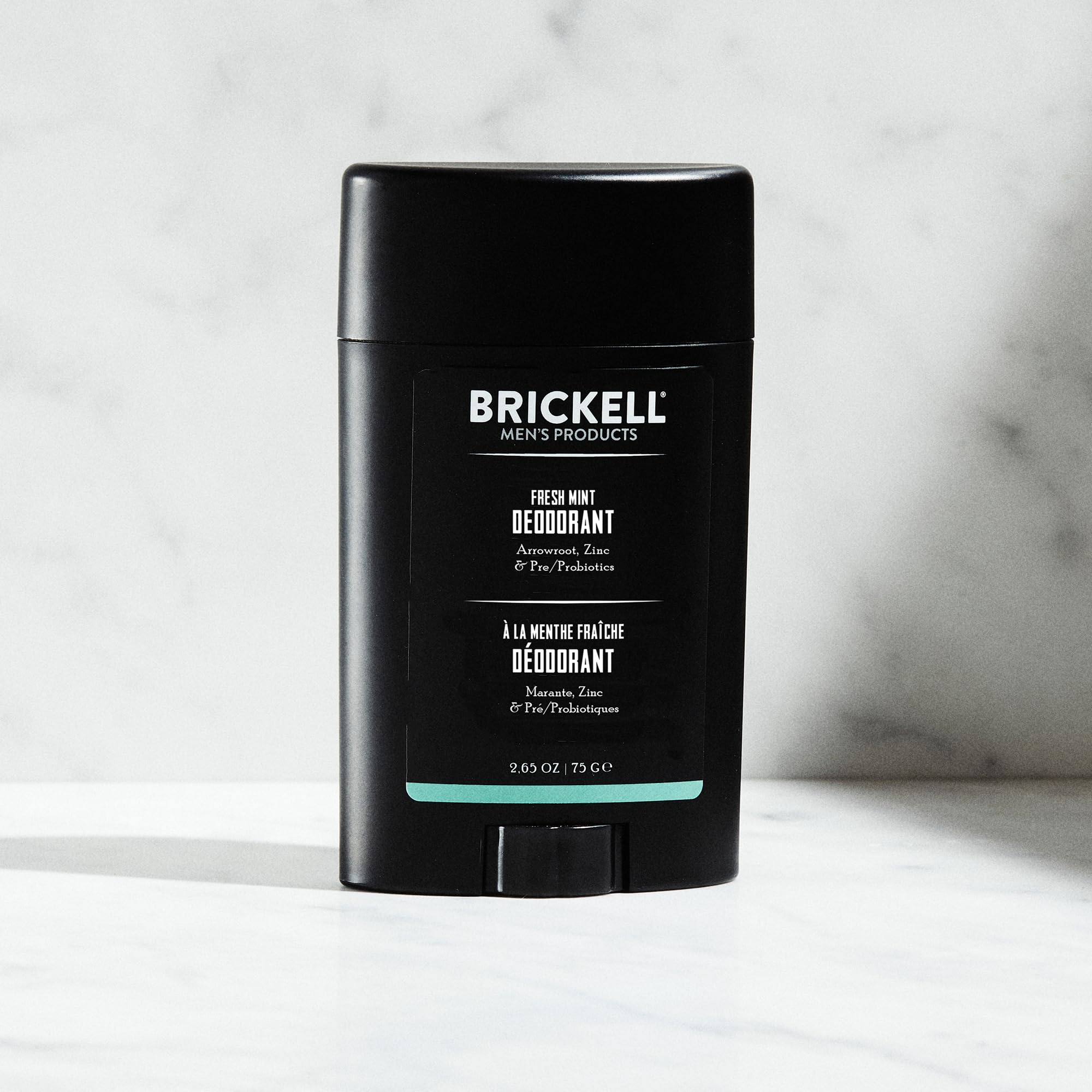 Brickell Men's Products deodorant for men with fresh mint scent, aluminum, alcohol, and baking soda free, featuring arrowroot powder and olive oil.