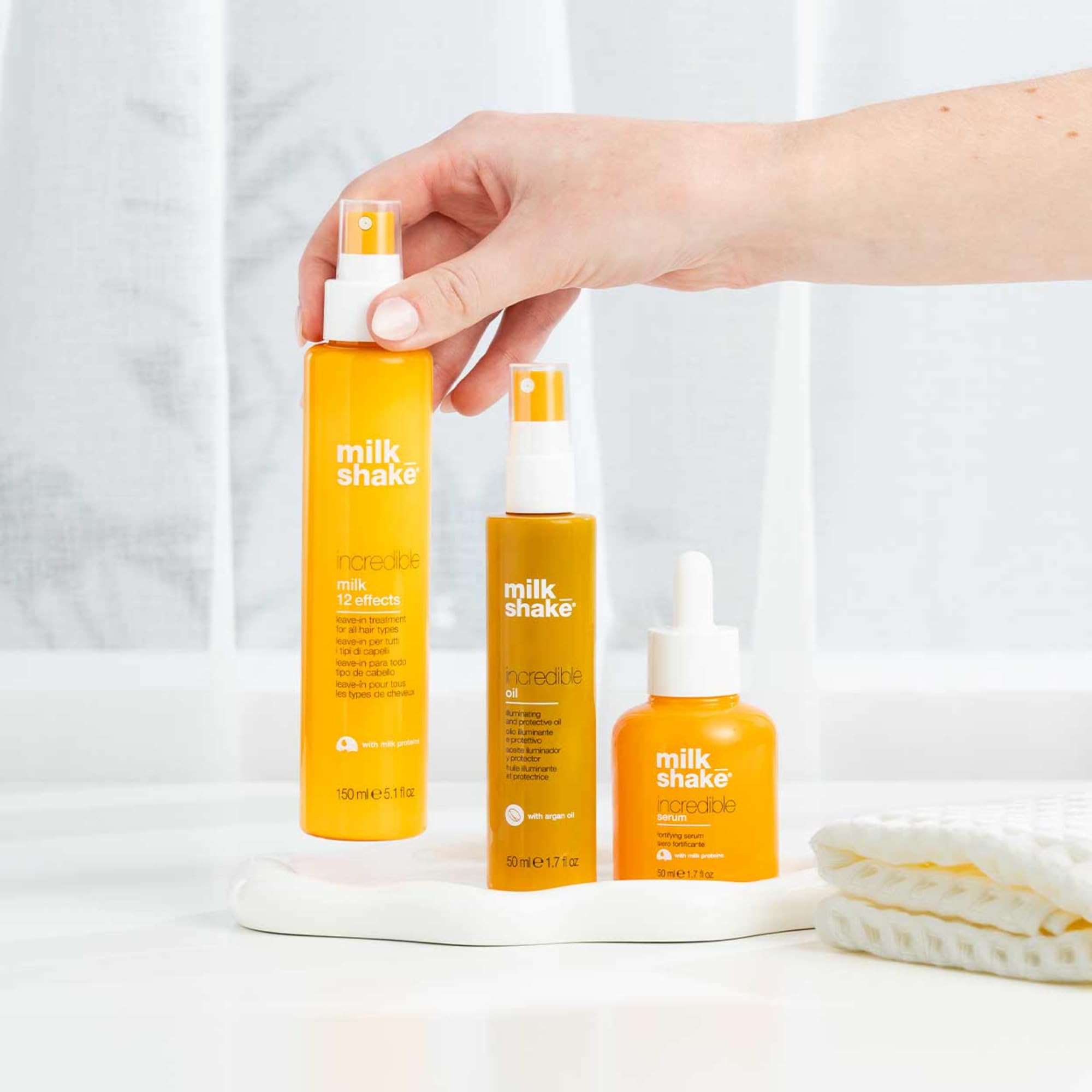 milk_shake Incredible Milk Leave-In Treatment conditioner bottle, 5.1 fl oz, showcasing the product designed to nourish and strengthen hair