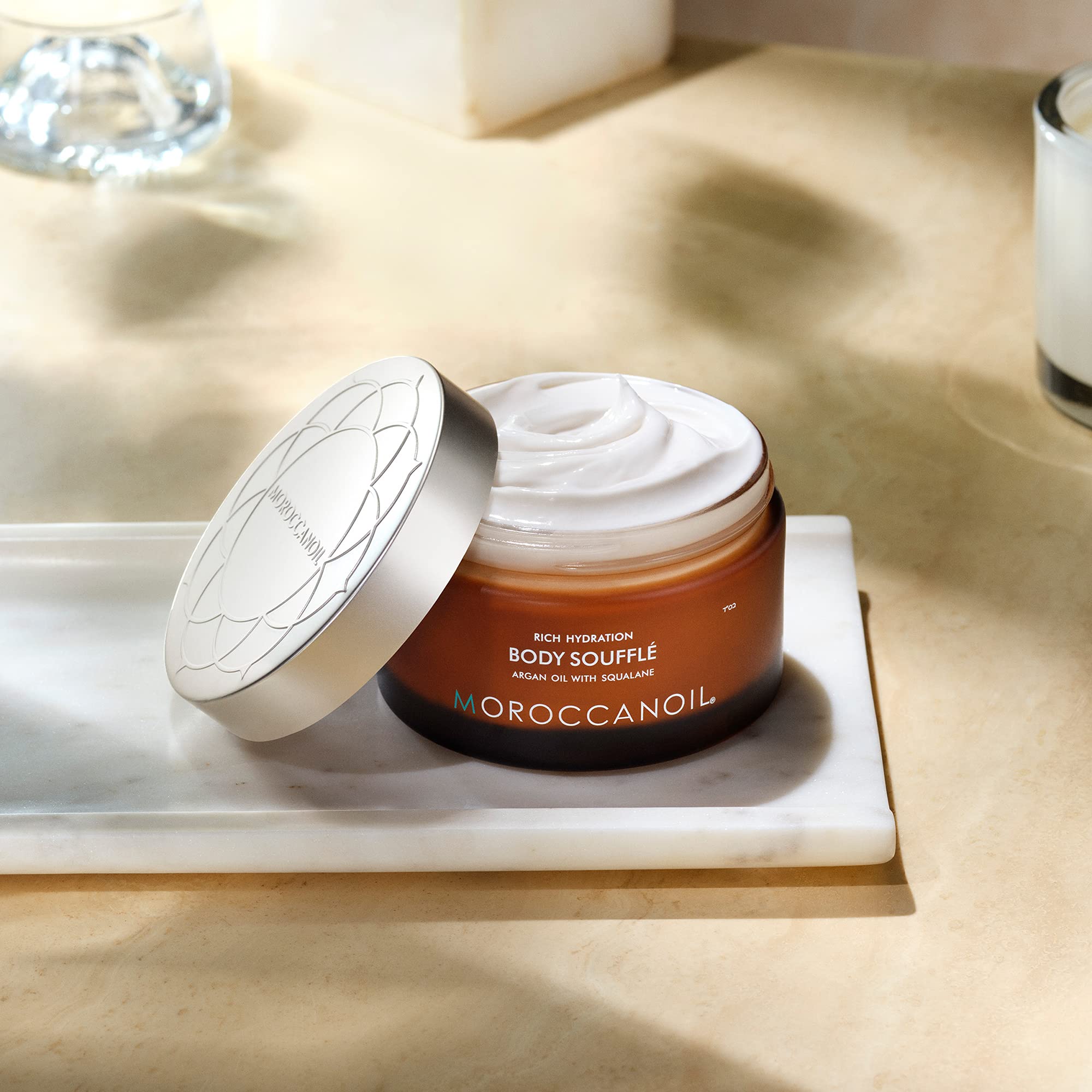 Moroccanoil Body Soufflé Fragrance Originale in 6.7 oz jar, featuring a smooth, luxurious texture and subtle floral scent.