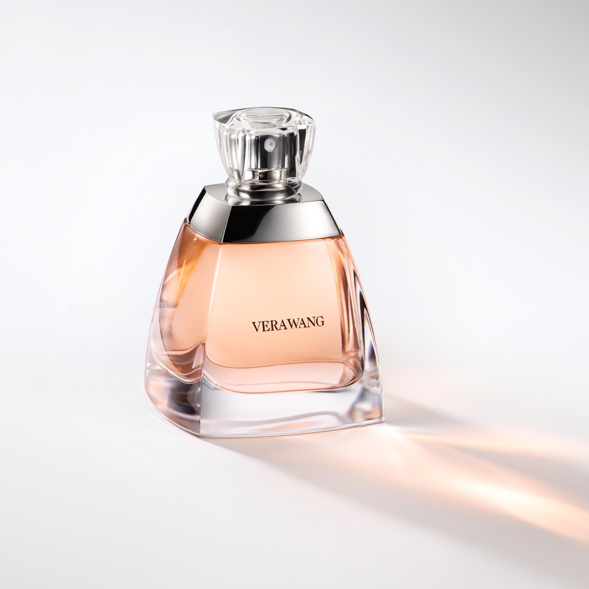Vera Wang Eau de Parfum 3.4oz bottle, elegant glass container, showcasing the women's fragrance with a sleek design.