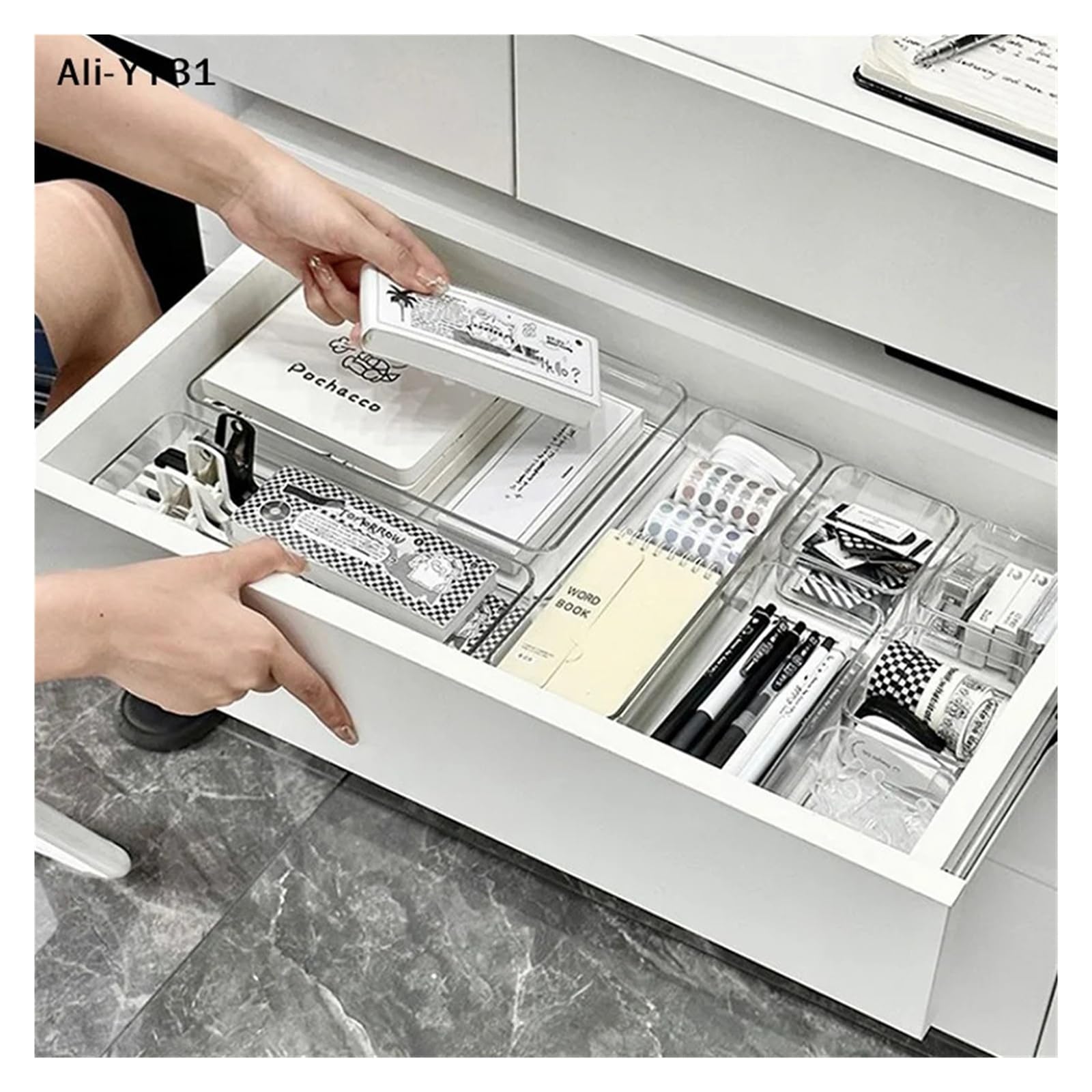 Stackable acrylic drawer organizer caddy with adjustable dividers, ideal for modular makeup and cosmetics storage.