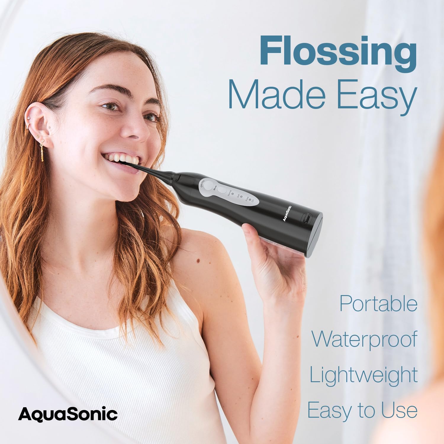 Aquasonic Aqua Flosser cordless water irrigator with adjustable water pressure and multiple tips for oral hygiene.
