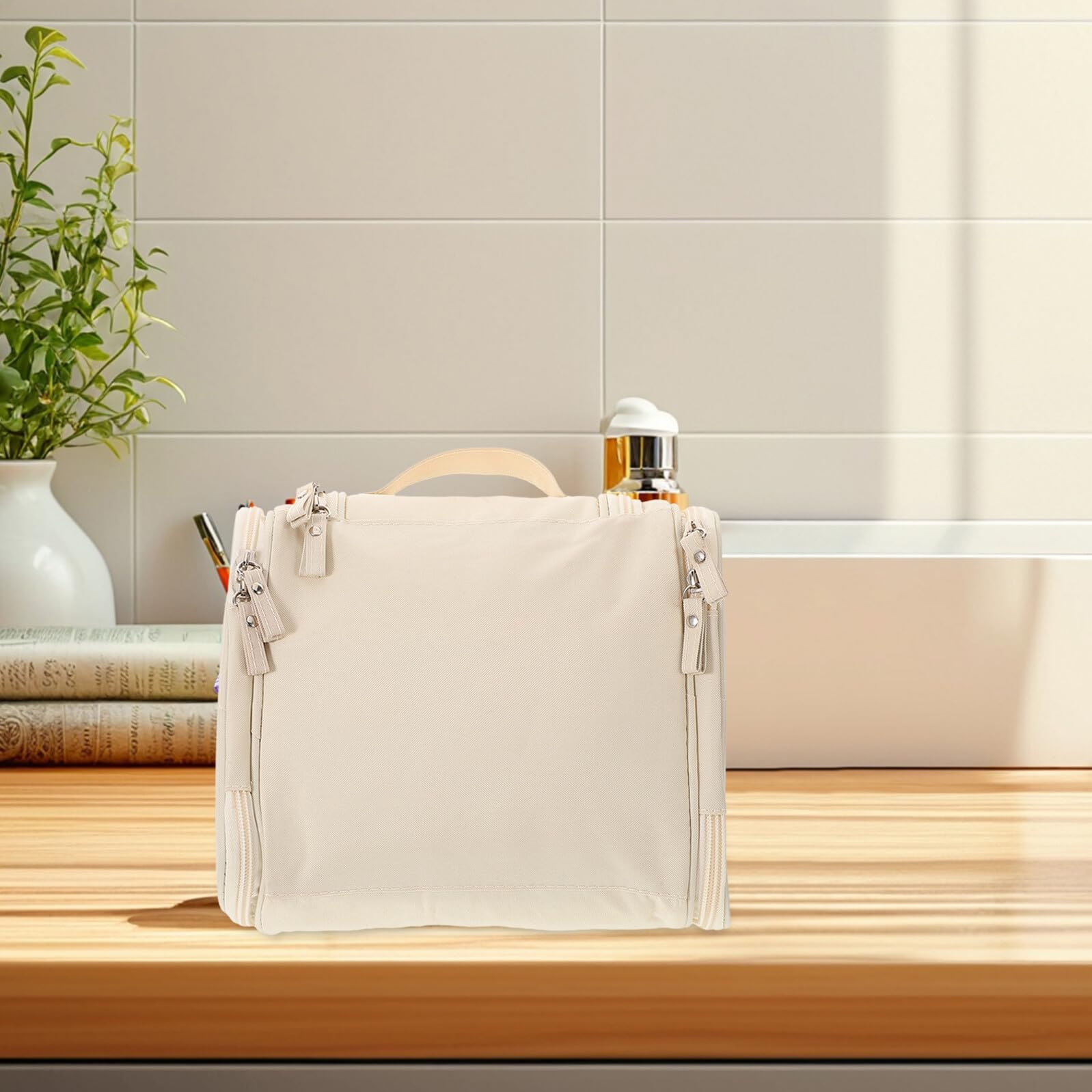 PartyKindom large beige waterproof cosmetic case with handle, ideal for travel toiletries, makeup, and skincare storage.